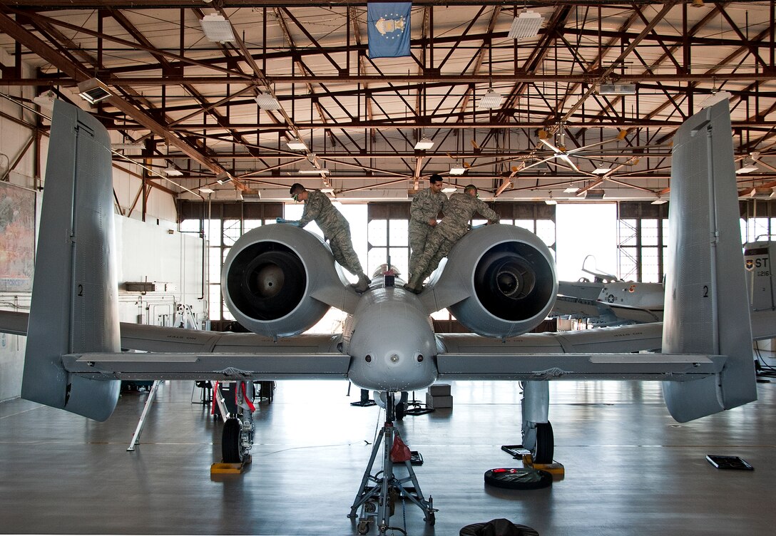 U.S. Air Force instructor Staff Sgt. Amolkumar Rathod, Airman 1st Class Alexander Glaus, and Airman Adam Huff of the 362nd Training Squadron, follow the steps of the Joint Oil Analysis Program (JOAP) to inspect an A-10 Aircraft during the A-10 Crew Chief course on February 28, 2014 at Sheppard Air Force Base, Texas. (U.S. Air Force photo by Frank Carter/Released)

