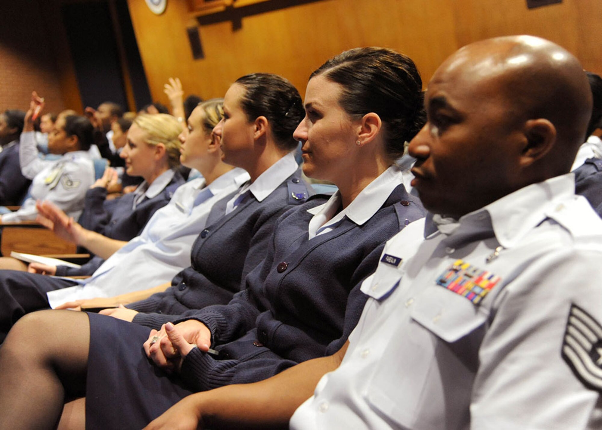 Noncommissioned officers assigned to the 59th Medical Wing attend a commander’s call hosted by Gen. Robin Rand, Air Education and Training Command commander, Feb. 24, 2014, at the Wilford Hall Ambulatory Surgical Center Auditorium, Joint Base San Antonio-Lackland, Texas. Rand spoke about the importance of the medical mission and of leading and educating Airmen. This was the general’s first visit to the 59th MDW since taking command of AETC in October 2013. (U.S. Air Force photo/Staff Sgt. Jerilyn Quintanilla)
