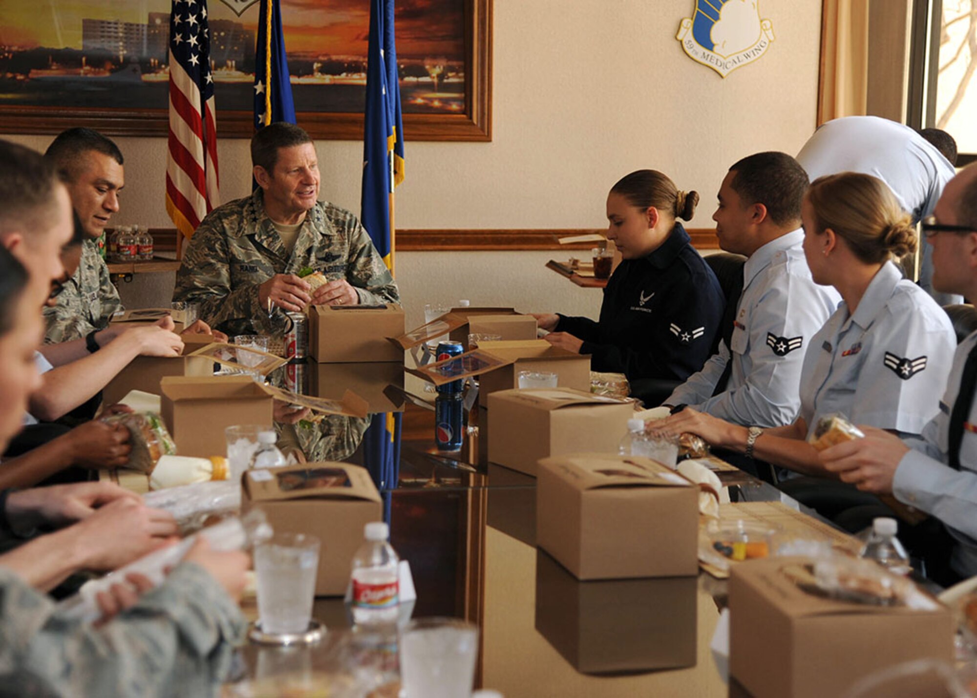 Gen. Robin Rand, Air Education and Training Command commander, hosts a lunch with junior enlisted Airmen assigned to the 59th Medical Wing, Feb. 24, 2014, at the Wilford Hall Ambulatory Surgical Center, Joint Base San Antonio- Lackland, Texas. Rand and Chief Master Sgt. Gerardo Tapia, AETC command chief, toured the 59th MDW to learn more about its military medical mission. This was Rand’s first visit to the wing since taking command of AETC in October 2013. (U.S. Air Force photo/Staff Sgt. Jerilyn Quintanilla)