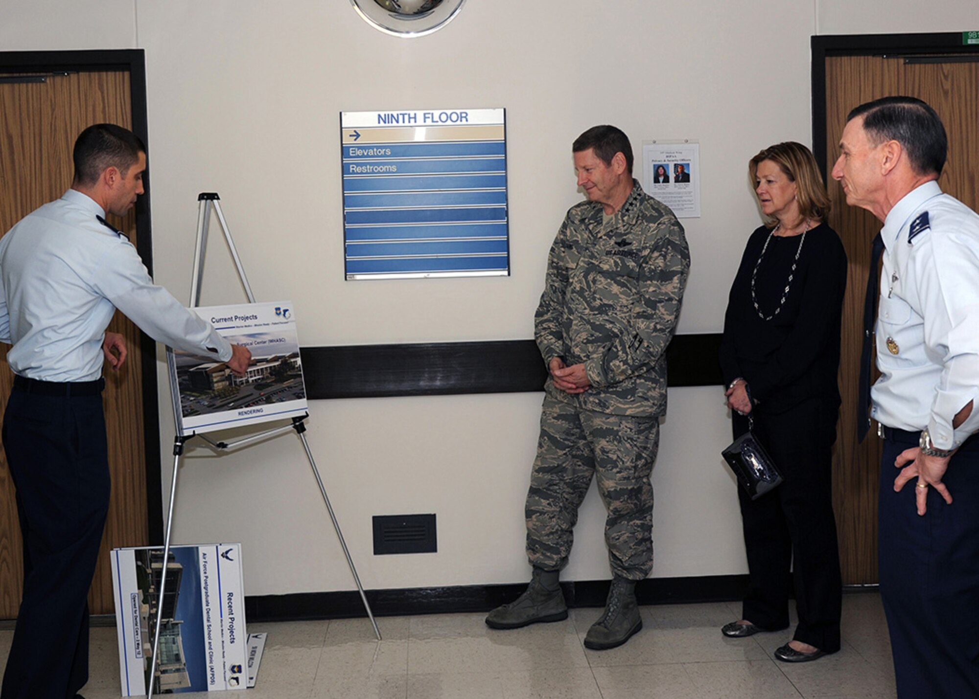 Maj. Patrick Ryan, Air Force Medical Support Agency Health Facilities Division, briefs Gen. Robin Rand, Air Education and Training Command commander, on several upcoming medical military construction projects during a visit to the Wilford Hall Ambulatory Surgical Center, Joint Base San Antonio-Lackland, Texas, Feb. 24, 2014. Future projects include the new WHASC, the San Antonio Military Medical Center Hyperbaric Medicine Addition, and the Reid Clinic replacement. (U.S. Air Force photo/ Staff Sgt. Jason Huddleston)
