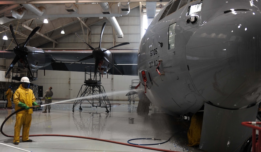U.S. Air Force Airman 1st Class Robert McMillian, 317th Aircraft Maintenance Squadron aircraft hydraulics apprentice, washes a C-130J Feb. 25, 2014, at Dyess Air Force Base, Texas. The flexible design of the C-130J enables it to be configured for many different missions, allowing for one aircraft to perform the role of many. It takes 12 hours to completely wash the C-130J. (U.S. Air Force photo by Senior Airman Kia Atkins/Released)