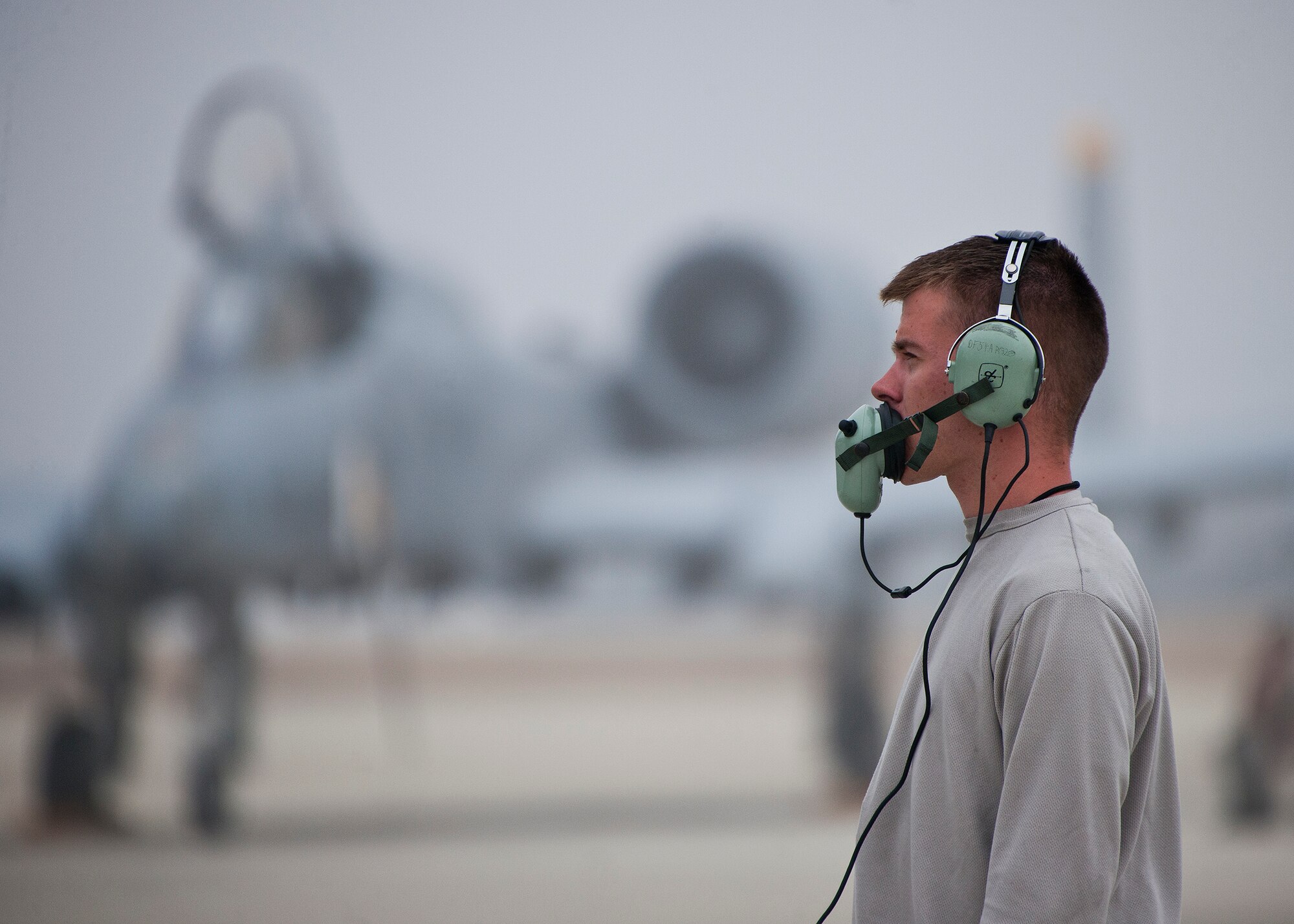 Airman 1st Class Ryan Drake communicates with his A-10 Thunderbolt II pilot prior to a morning Weapon System Evaluation Program sortie at Eglin Air Force Base, Fla., Feb. 19.  The A-10s from Davis-Monthan Air Force Base, Ariz., participated in the week-long mission known as Combat Hammer, in which they released air-to-ground munitions.  The Combat Hammer WSEP program is managed by the 86th Fighter Weapons Squadron, part of the 53rd Wing.  (U.S. Air Force photo/Samuel King Jr.)