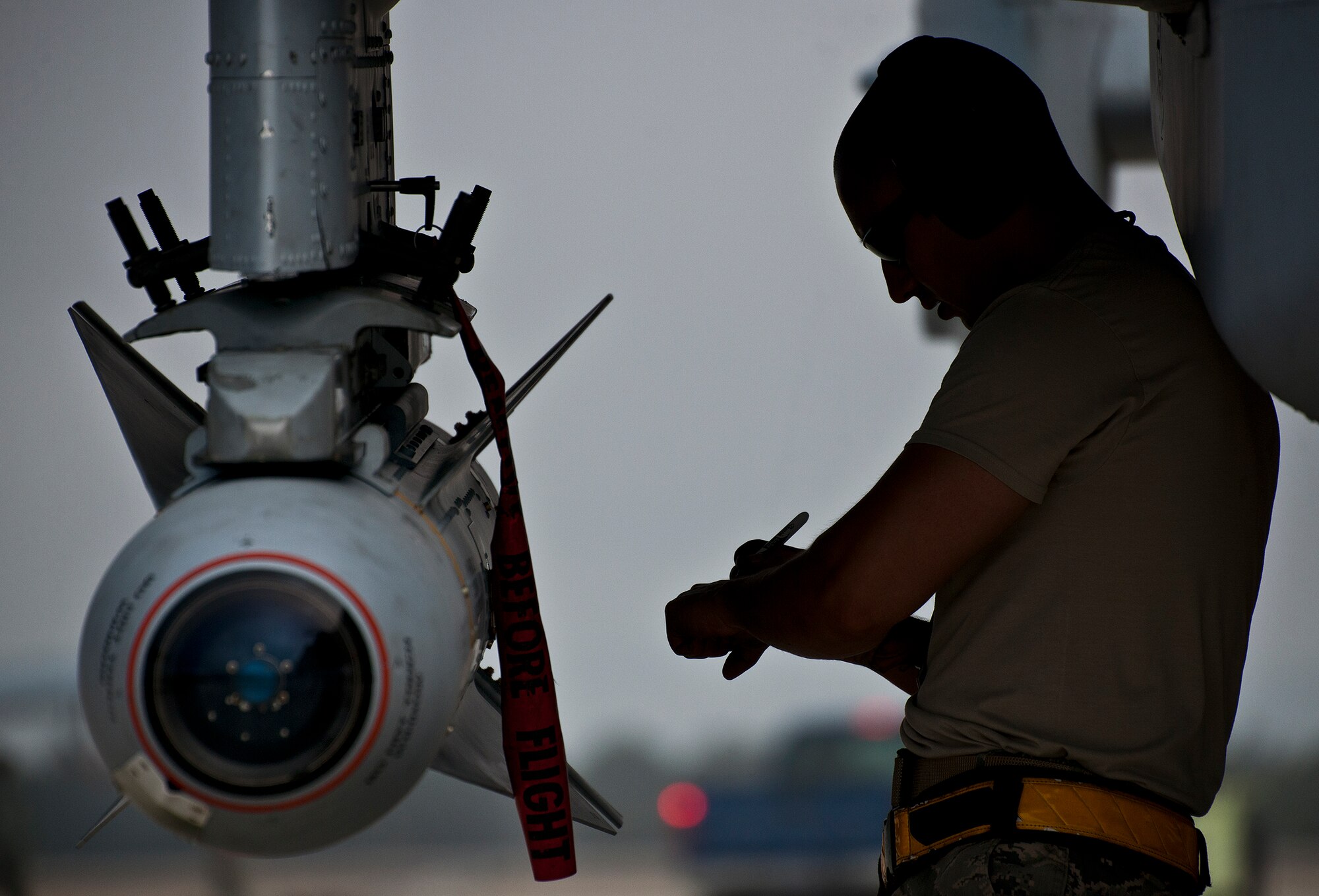 Staff Sgt. Chris Martinez, of the 355th Aircraft Maintenance Squadron, verifies his checklist after loading an AGM-65 onto an A-10 Thunderbolt II prior to a sortie at Eglin Air Force Base, Fla., Feb. 19.  The A-10s from Davis-Monthan Air Force Base, Ariz., participated in the week-long mission known as Combat Hammer, in which they released air-to-ground munitions.  The Combat Hammer WSEP program is managed by the 86th Fighter Weapons Squadron, part of the 53rd Wing.  (U.S. Air Force photo/Samuel King Jr.)