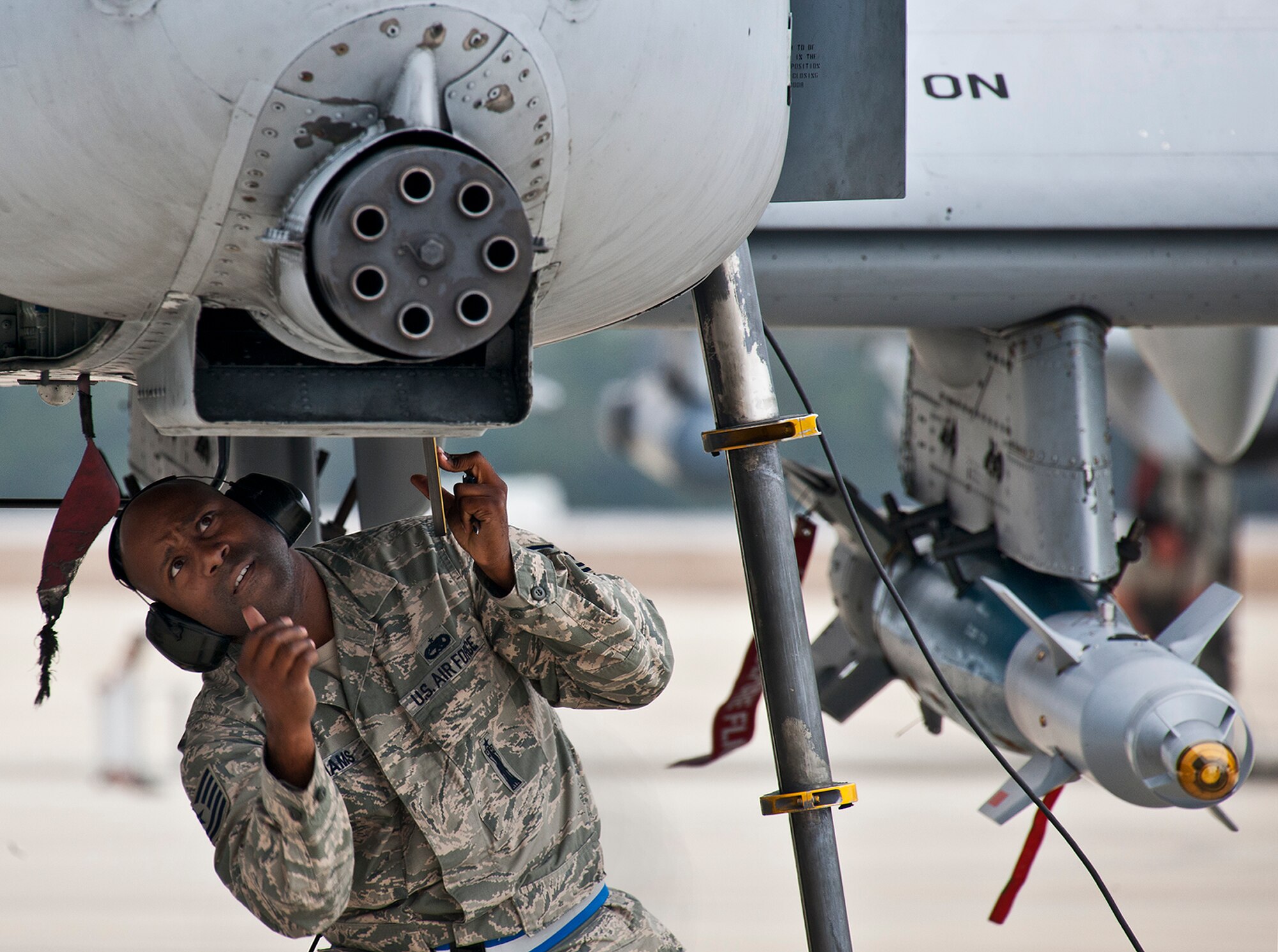 Tech. Sgt. Jerrime Williams, of the 355th Aircraft Maintenance Squadron, performs a supervisory weapons inspection prior to a Weapon System Evaluation Program sortie at Eglin Air Force Base, Fla., Feb. 19.  The A-10s from Davis-Monthan Air Force Base, Ariz., participated in the week-long mission known as Combat Hammer, in which they released air-to-ground munitions.  The Combat Hammer WSEP program is managed by the 86th Fighter Weapons Squadron, part of the 53rd Wing.  (U.S. Air Force photo/Samuel King Jr.)