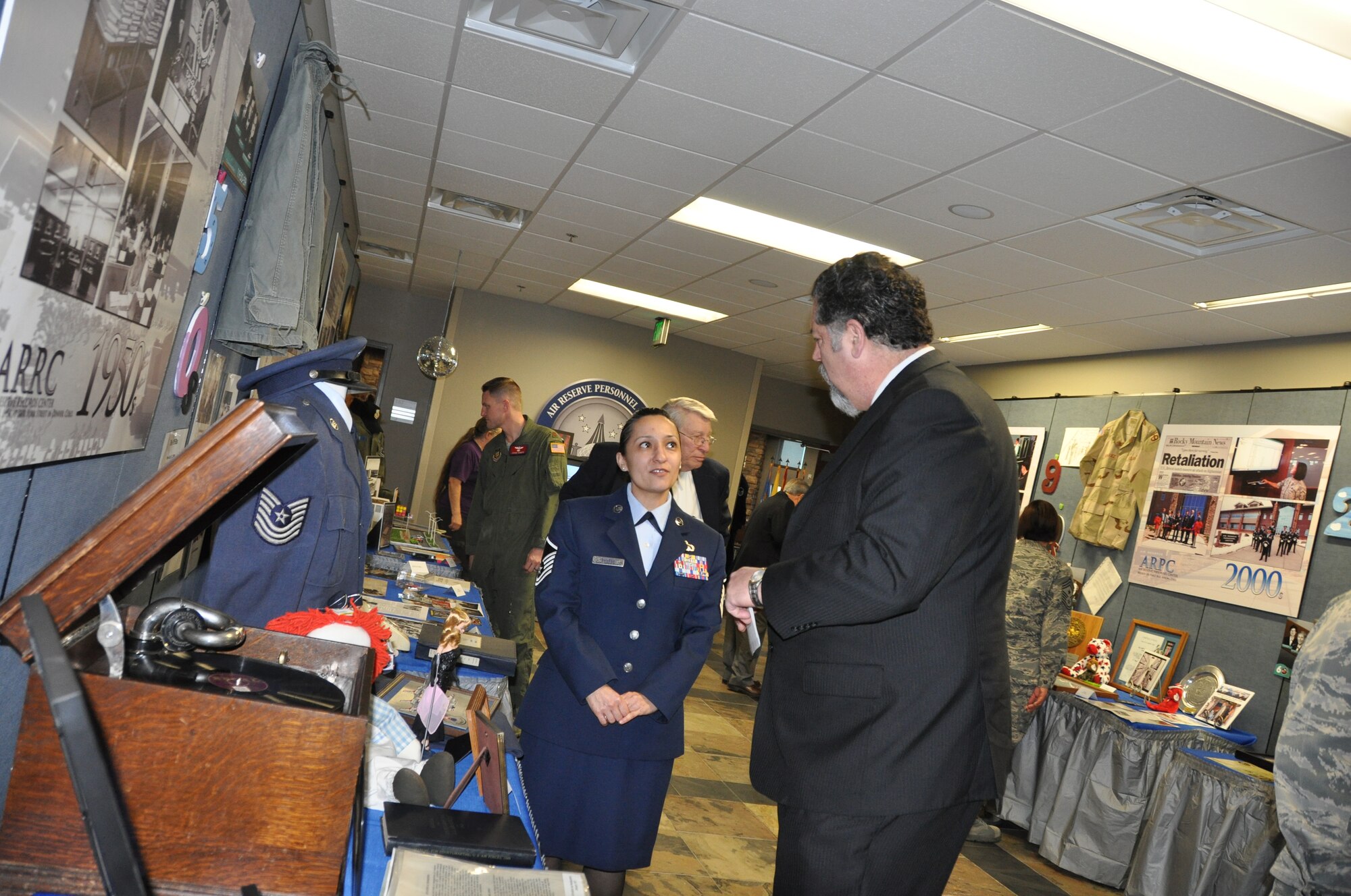 More than 150 people attended the Air Reserve Personnel Center’s exhibition of history as the center commemorated its 60th anniversary Feb. 28, 2014, on Buckley Air Force Base, Colo. The event was open to all current and former ARPC employees, Buckley Air Force Base leadership and community partners. They were treated to a briefing highlighting ARPC’s history and advancement in technology, policies and procedures of six decades and historic memorabilia on display for everyone to see. (U.S. Air Force photo/Tech. Sgt. Rob Hazelett)