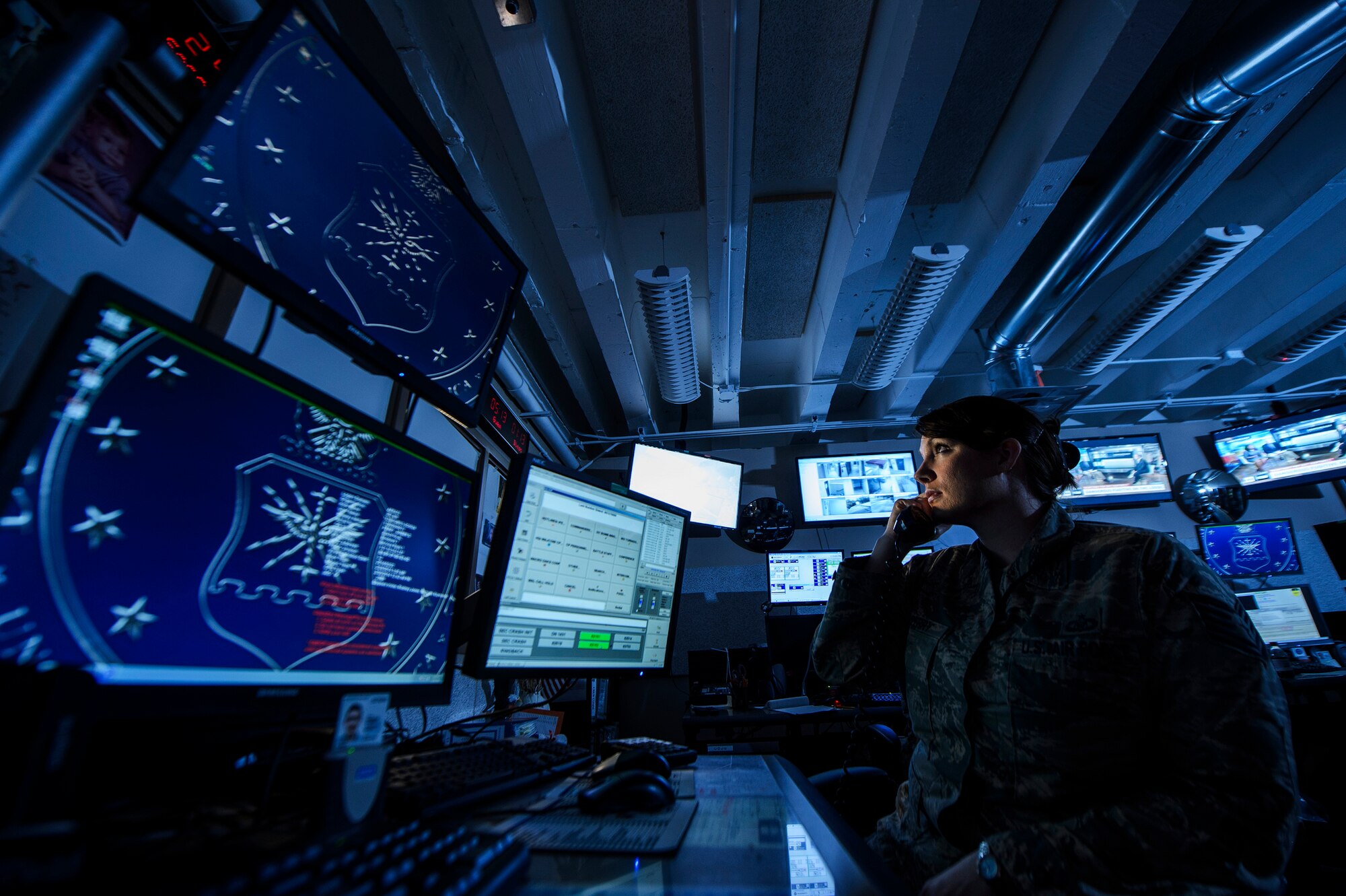 Tech. Sgt. Amber Perry, 2nd Bomb Wing command post controller, monitors base activities to help facilitate the wing's mission at Barksdale Air Force Base, La., Feb. 24, 2014. (U.S. Air Force photo by Staff Sgt. Jonathan Snyder/RELEASED)