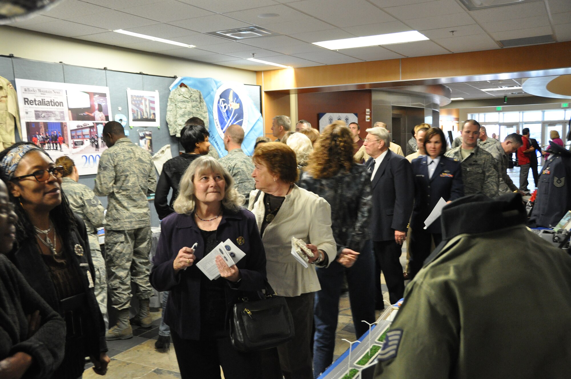 More than 150 people attended the Air Reserve Personnel Center’s exhibition of history as the center commemorated its 60th anniversary Feb. 28, 2014, on Buckley Air Force Base, Colo.. The event was open to all current and former ARPC employees, Buckley Air Force Base leadership and community partners. They were treated to a briefing highlighting ARPC’s history and advancement in technology, policies and procedures of six decades and historic memorabilia on display for everyone to see. (U.S. Air Force photo/Tech. Sgt. Rob Hazelett)