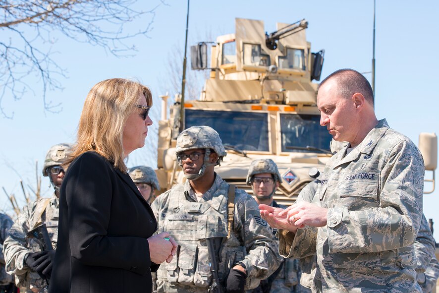 Secretary of the Air Force Deborah Lee James speaks with U.S. Air Force Col. Paul Gardetto, 23d Medical Group commander, during a static display tour at Moody Air Force Base, Ga., Feb. 28, 2014. Personnel from the 23d MDG, 23d Mission Support Group and 820th Base Defense Group had the opportunity to discuss their equipment and mission with the secretary during her visit. (U.S. Air Force photo by Airman 1st Class Ryan Callaghan/Released)