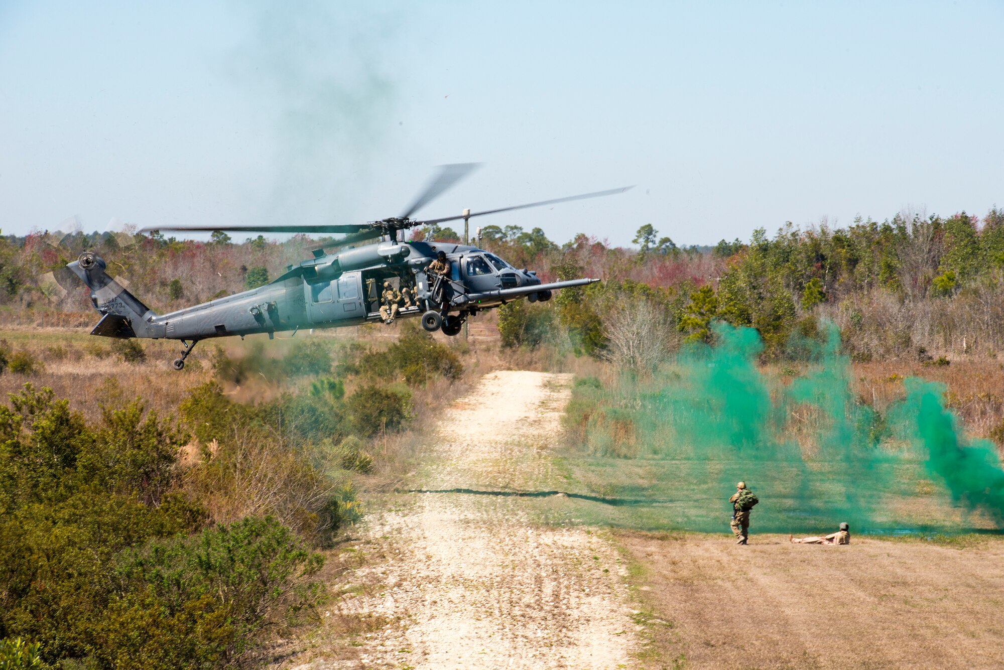 An HH-60G Pave Hawk lands during a demonstration at Moody Air Force Base, Ga., Feb. 28, 2014. The demo, which was held for Secretary of the Air Force Deborah Lee James, showcased Moody’s personnel recovery mission. (U.S. Air Force photo by Airman 1st Class Ryan Callaghan/Released)