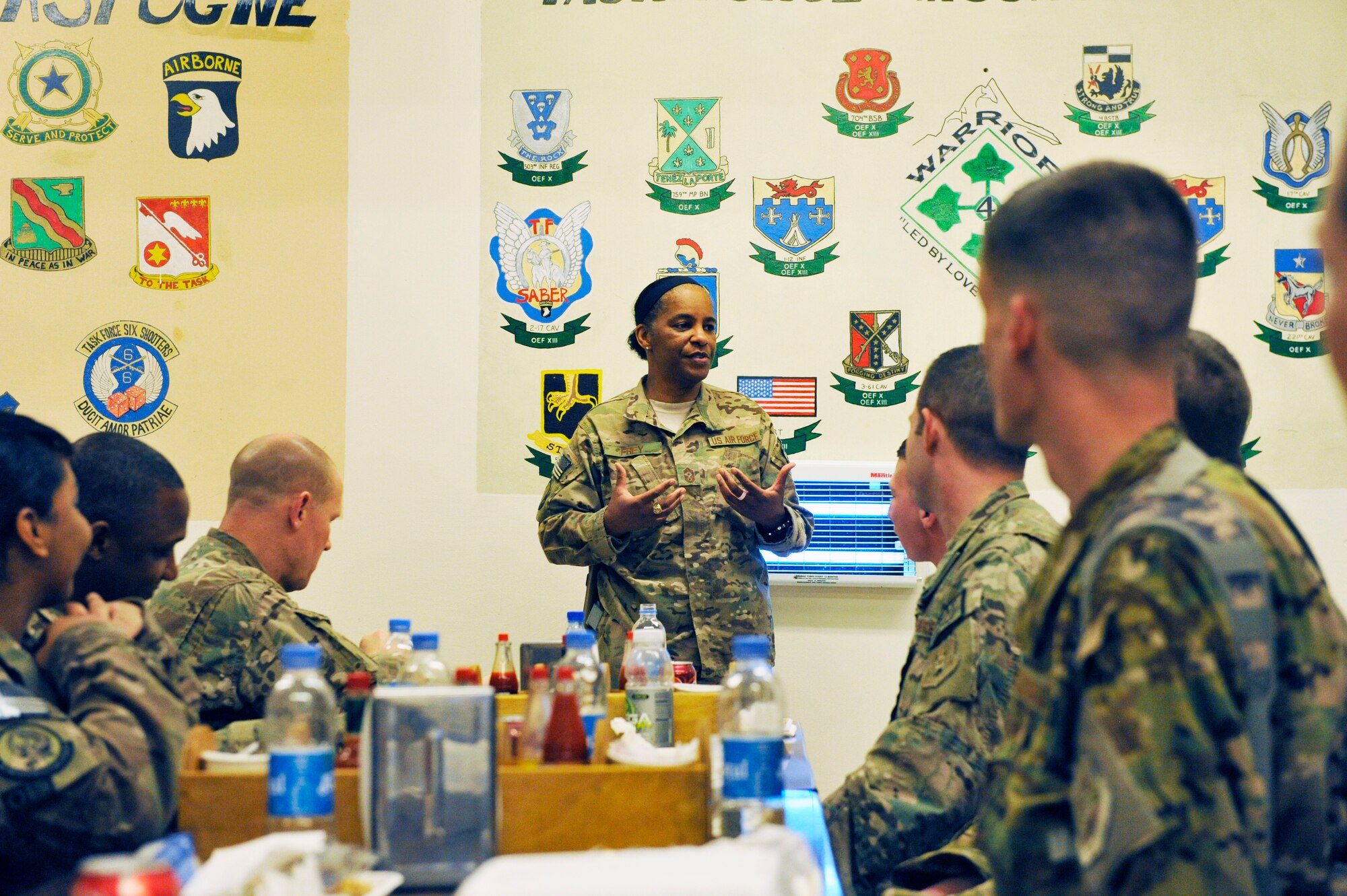 Command Chief Master Sgt. Shelina Frey, U.S. Air Force Central Command, talks to Airmen during a luncheon at Jalalabad Airfield, Afghanistan, Feb. 25, 2014. Frey, along with Brig. Gen. Patrick Malackowski, 455th Air Expeditionary Wing commander, spent the day talking to airmen at Jalalabad and recognizing outstanding performers there.(U.S. Air Force photo by Senior Master Sgt. Gary J. Rihn/Released)