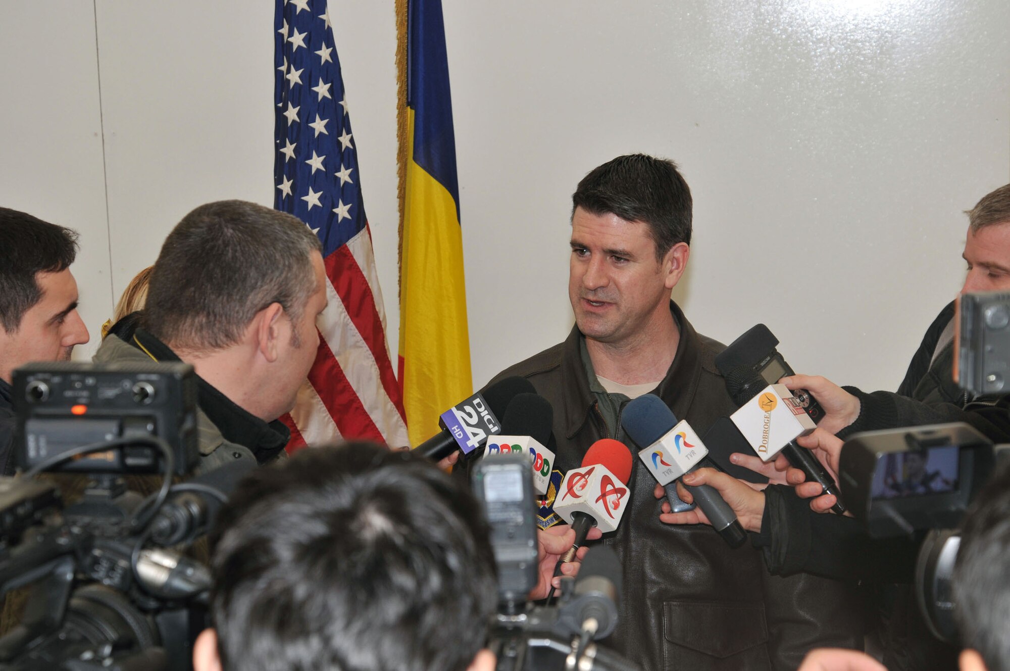 Col. Robert Dotson, MK Air Base Senior Airfield Authority, answers questions
from the Romanian media following the ribbon cutting ceremony Feb. 28. (U.S. Air Force photo/ Senior Master Sgt. Steve Horton)