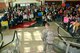 Family and friends alike applaud as Security Forces personnel from the Wisconsin Air National Guard's 115th Fighter Wing return to Dane County Regional Airport March 2, where they are reunited with loved ones for the first time in over six months. Twenty six members of the Wing's Security Forces Squadron deployed in support of Operation Enduring Freedom/Combined Joint Task Force-Horn of Africa and secured 3,500 personnel and $7.2 billion worth of assets within their area of responsibility. (Air National Guard photo by Master Sgt. Paul Gorman)