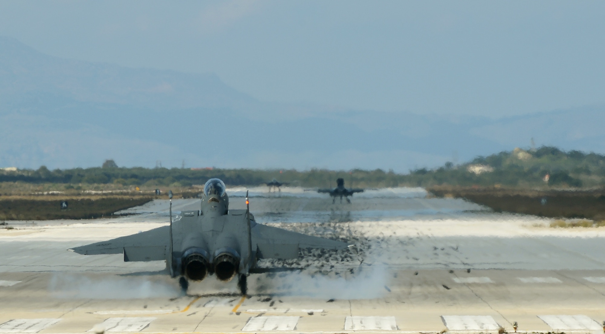 Two F-15E Strike Eagles land at Souda Air Base, Greece, while participating in joint war-fighting training with the Hellenic air force, Feb. 27, 2014. More than 250 Airmen deployed to Crete to work with NATO partners and build upon a strong, military relationship. (U.S. Air Force photo by Staff Sgt. Thomas Trower/Released)