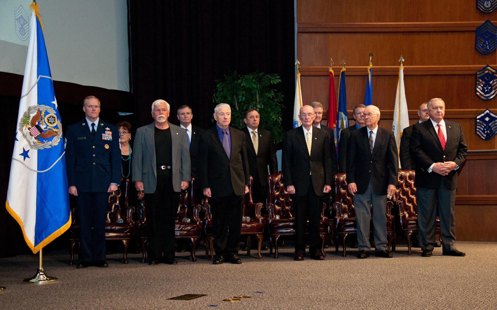 Maxwell Air Force Base, Ala. - Chief Master Sergeant of the Air Force James A. Cody, joins former chiefs and surviving family members on stage during a CMSAF positional colors ceremony at the Air Force Senior Noncommissioned Officer Academy, Thursday, Feb. 27, 2014. (USAF photo by Donna L. Burnett/Released)