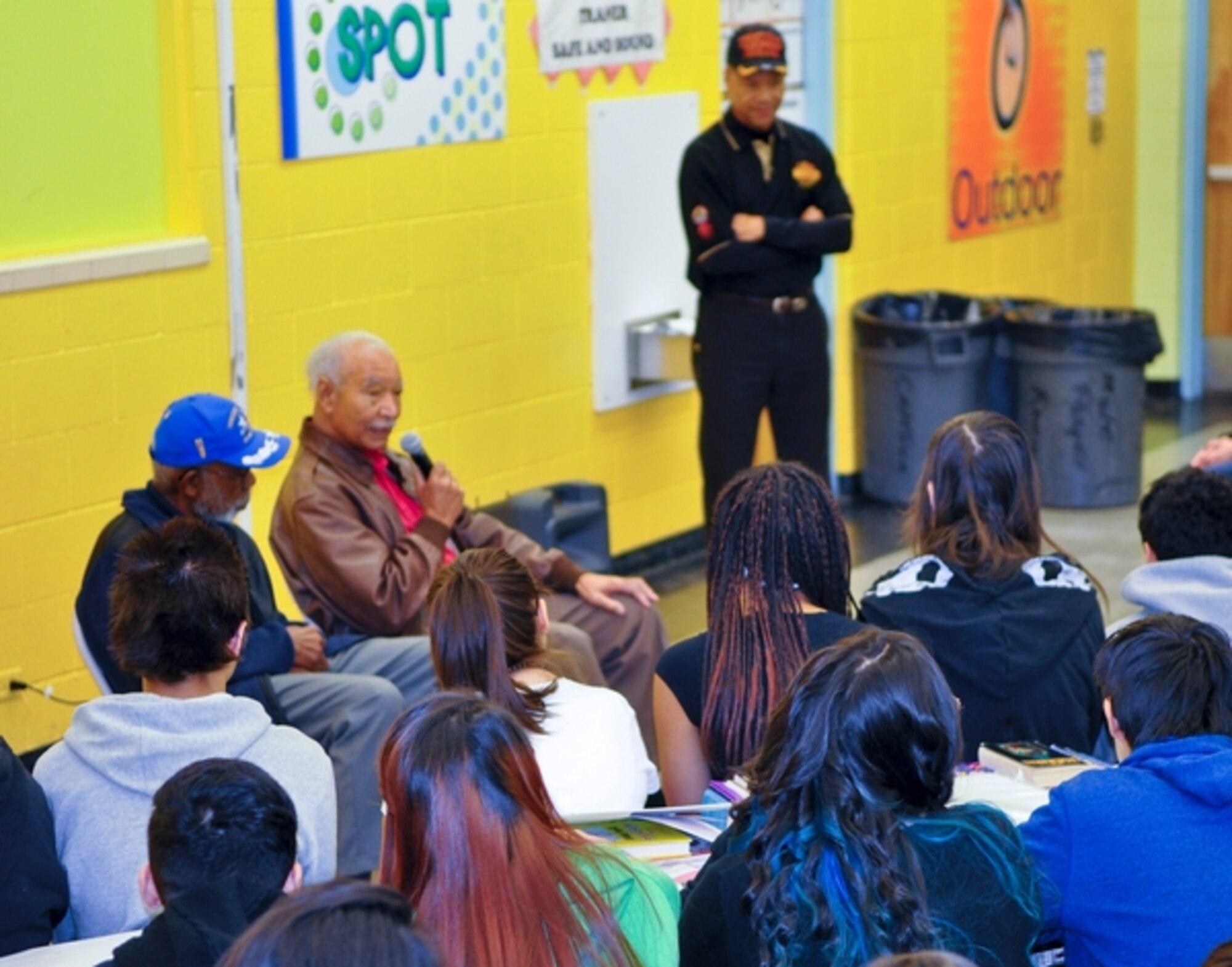 Retired Army Air Corps Lt. Cols. Robert Ashby and Theodore Lumpkin deliver a
message of self-confidence and perseverance to Traner Middle School students
on Feb. 28. Ashby and Lumpkin are original Tuskegee Airmen who came to Reno
for the formal announcement of a new western region chapter, named after
original Tuskegee Airman George W. Porter who passed away in Feb. 2013. The
Tuskegee Airmen  were the first African-American service members allowed into
flight training and flew over 15,000 combat missions during World War II.
Photo by Maj. Dennis Fournier, Joint Force Headquarters Public Affairs
