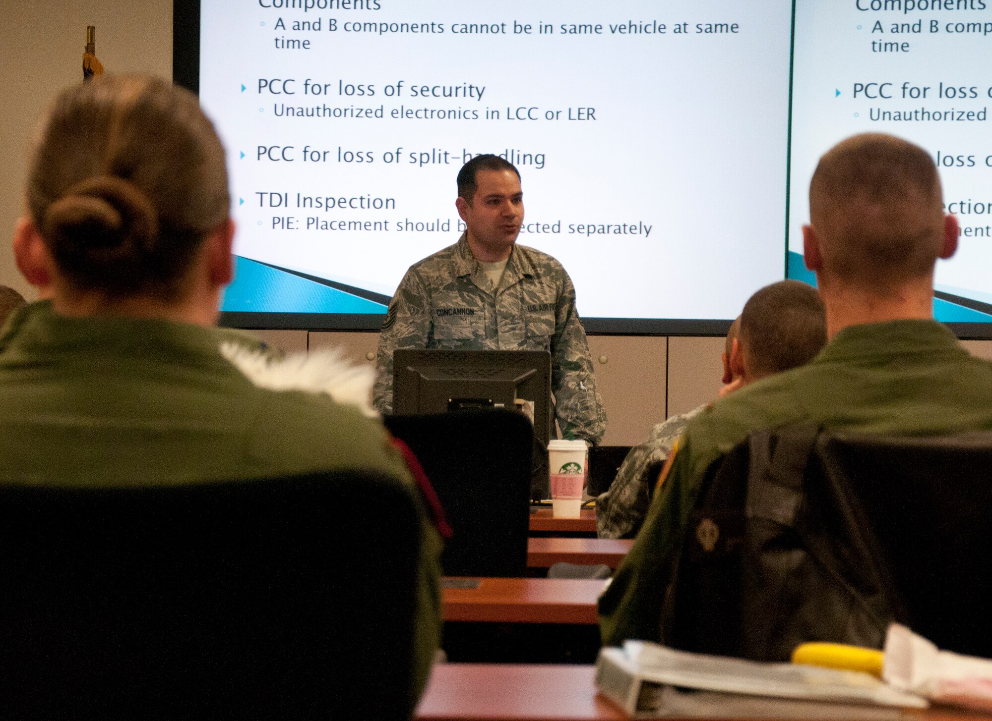 Tech. Sgt. Eugene Concannon, 90th Operations Support Squadron instructor, provides monthly instruction to missile crews in the 90th Operations Group Feb. 13, 2014. (U.S. Air Force photo by Airman 1st Class Jason Wiese)