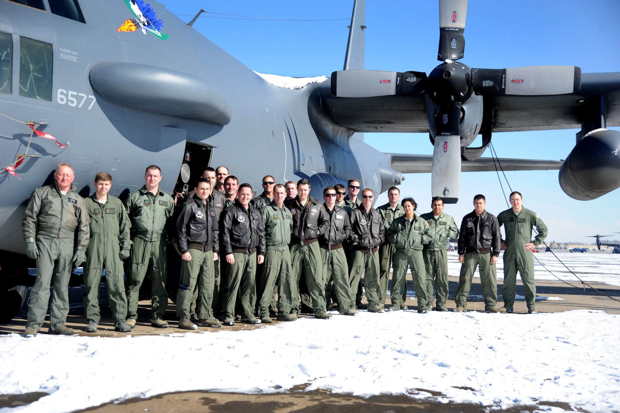 Members of the 16th Special Operations Squadron stand alongside their prized AC-130H Spectre gunship Feb. 2, 2014 at Cannon Air Force Base, N.M. As this aircraft is sent into retirement, the sensor operators bid farewell to an aerial asset that has not only served its country proud, but leaves a lasting American Legacy to future generations. (U.S. Air Force Photo/Airman 1st Class Chip Slack)