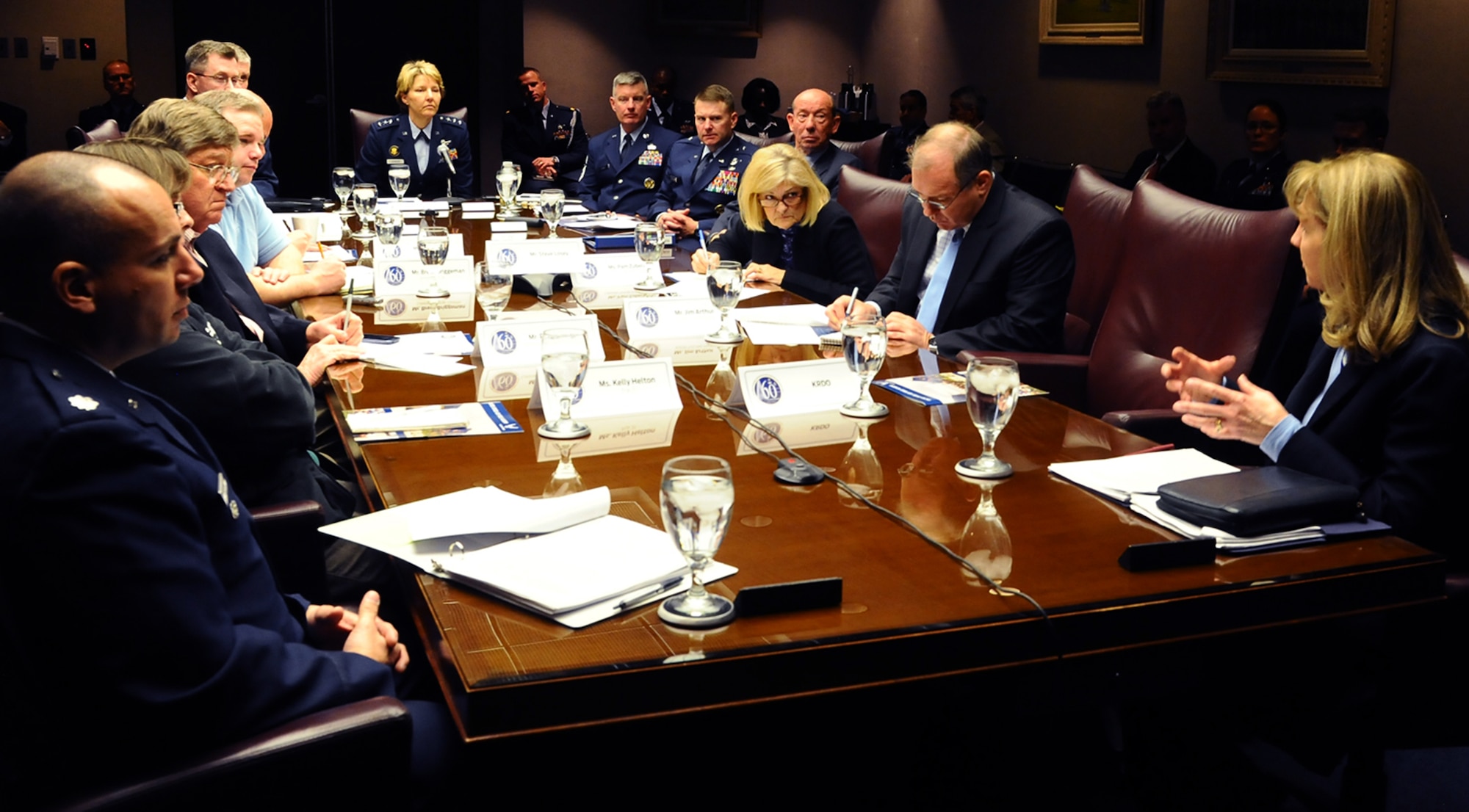 Academy Superintendent Lt. Gen. Michelle D. Johnson (center) meets with media representatives from Colorado Springs and Air Force Times at the Academy March 3. The general  announced the Academy's fiscal year 2015 budget impact on March 4. (Master Sgt. Kenneth Bellard/Air Force photo)