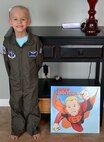 Brayden Mitchell, son of the late F-16 pilot 2nd Lt. Dave Mitchell, poses in a flight suit. Brayden, who wants to follow in his father's footsteps, was recently diagnosed with kidney cancer. (Courtesy photo)