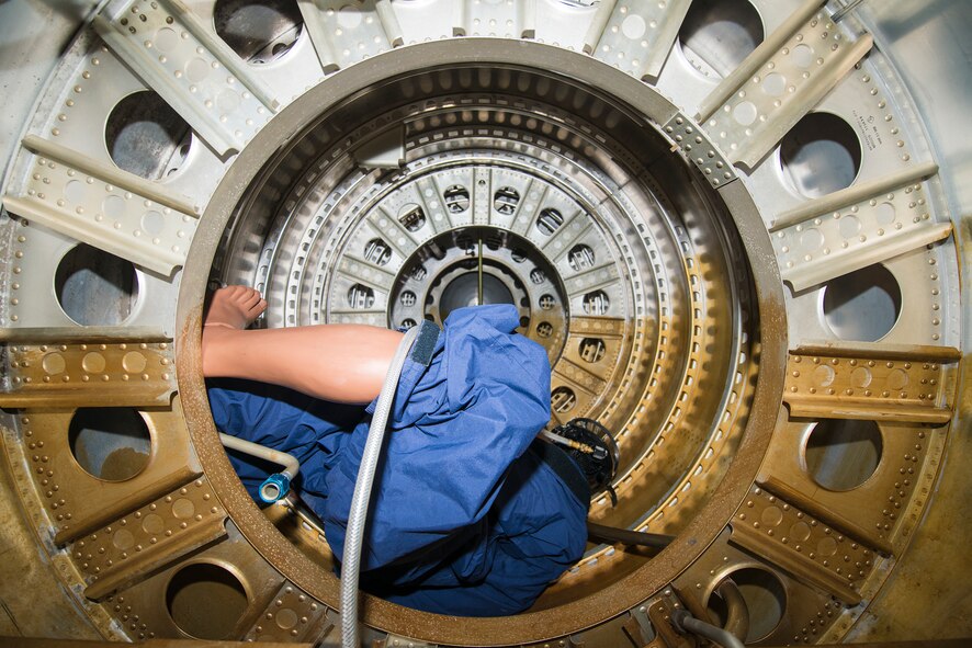 A dummy waits to be rescued from a confined space trainer during an extraction exercise at Moody Air Force Base, Ga., Mar. 4, 2014. The confined space trainer simulates the working conditions inside an HC-130 fuselage tank. (U.S. Air Force photo by Airman 1st Class Ryan Callaghan/Released)
