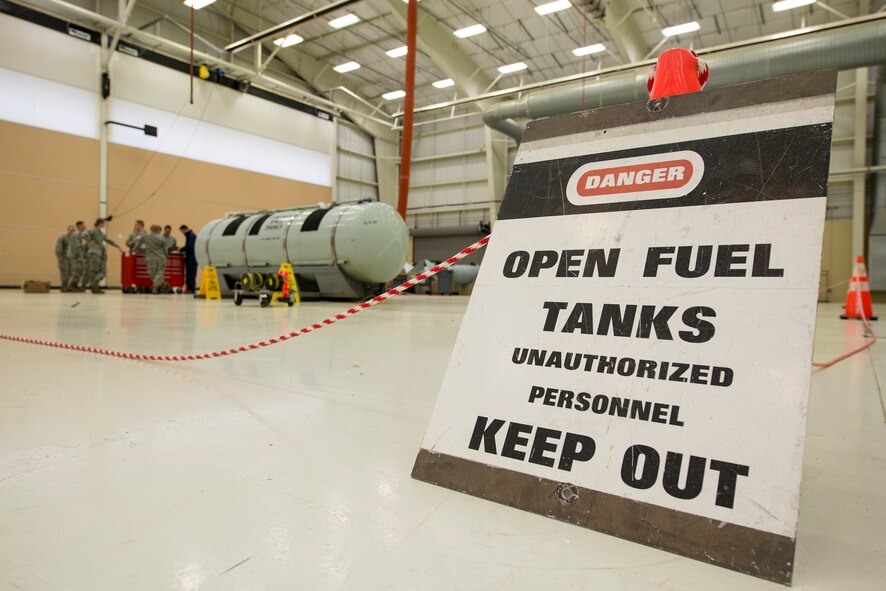Airmen from the 23d Component Maintenance Squadron prepare for a confined space casualty extraction exercise  at Moody Air Force Base, Ga., Mar. 4, 2014. The 23d CMS practiced extracting unconscious, incapacitated Airmen from confined spaces, such as the inside of fuel tanks, during the yearly exercise. (U.S. Air Force photo by Airman 1st Class Ryan Callaghan/Released)
