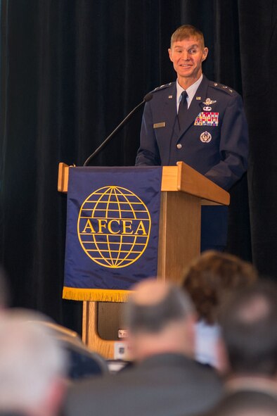 NEWTON, Mass. - Maj. Gen. Craig Olson, C3I and Networks program executive officer, speaks to attendees during the first day of the New Horizons Symposium Feb. 25. The symposium, which is sponsored by the Lexington-Concord Chapter of the Armed Forces Communications and Electronics Association, provides an opportunity for Life Cycle Management Center program executive officers and program managers to exchange information with industry on current and emerging business opportunities. (U.S. Air Force photo by Rick Berry)