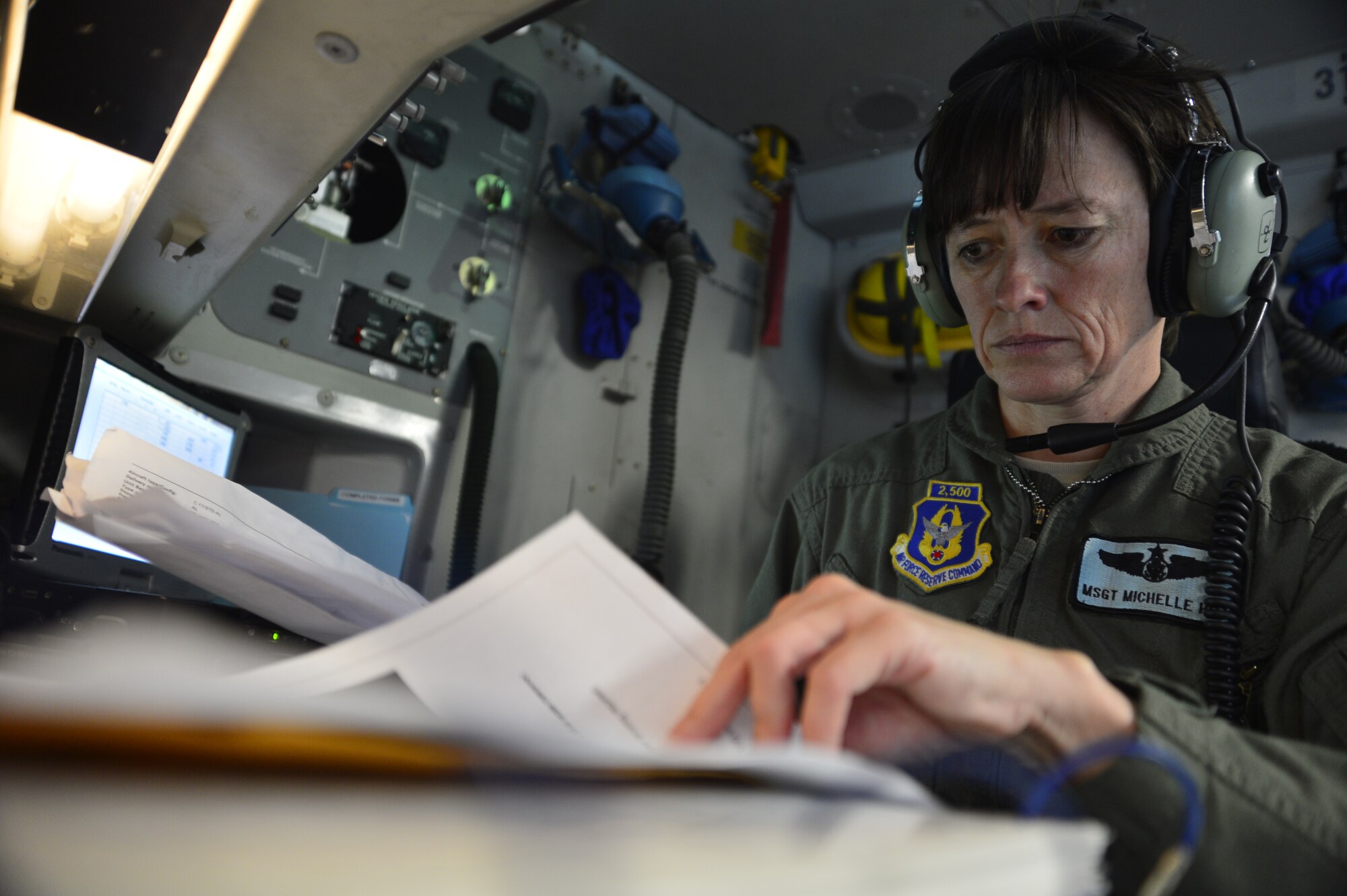 Master Sgt. Michelle Hite, 326th Airlift Squadron loadmaster, prepares a C-17 Globemaster III for departure during Operation Patriot Sands, Feb. 22, 2014 at Homestead Air Reserve Base, Fla. Patriot Sands is a joint response exercise with Air Force and federal agencies which simulates a national contingency event. (U.S. Air Force photo/Staff Sgt. Elizabeth Morris)