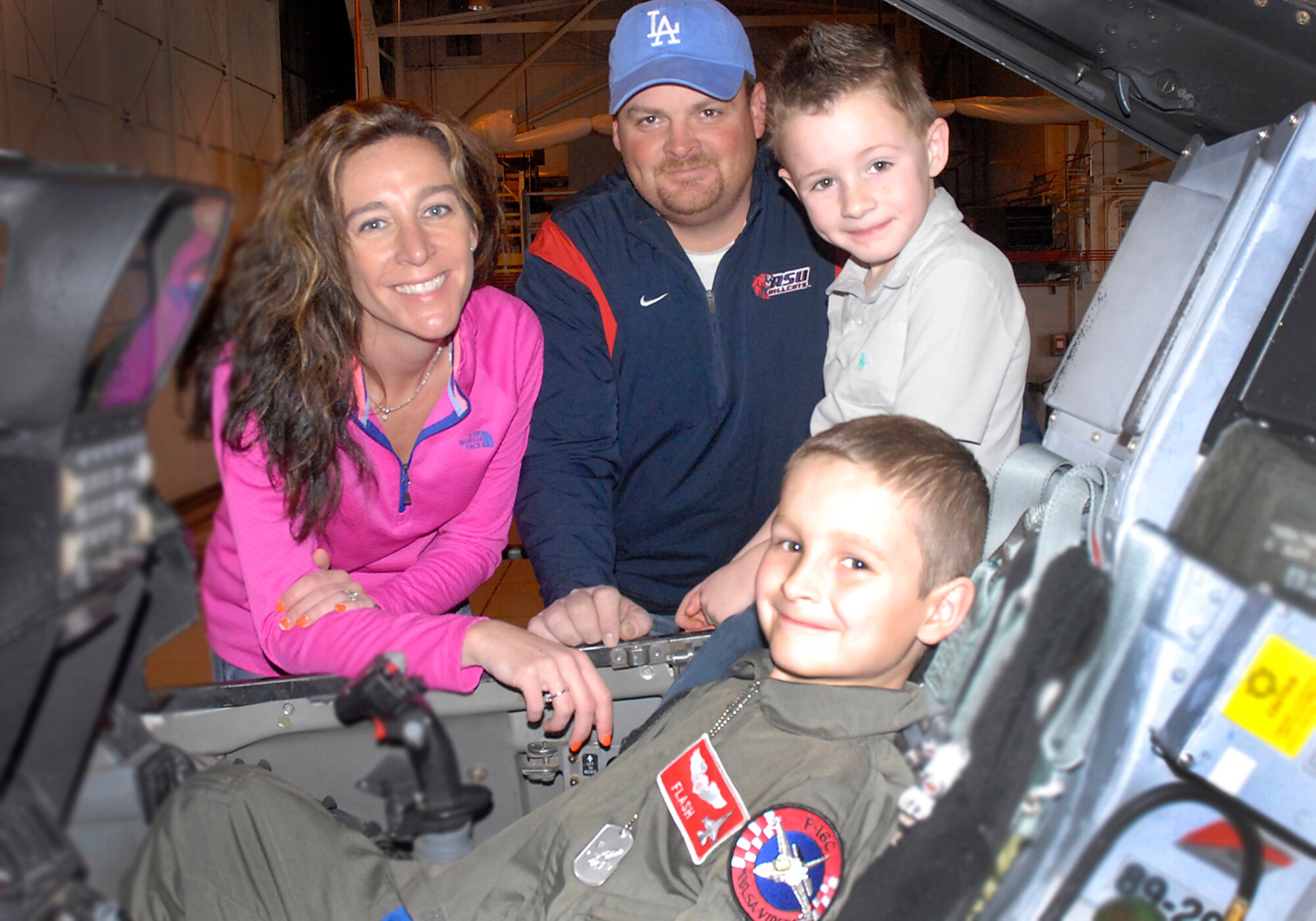 Zip "Flash" Gordon seizes the opportunity to sit in an F-16 Fighting Falcon while being a "Pilot for a Day", 19 February 2014,  at the 138th Fighter Wing, Oklahoma Air National Guard, Tulsa, Okla.  Flash was accompanied by his parents, Jacob and Amy Gordon, and his good friend Ethan Sikes.  (U.S. National Guard photo by Senior Airman Jasmine Stone/Released)