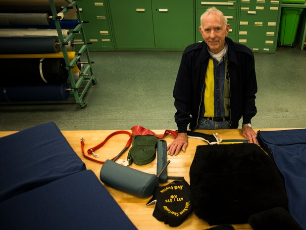Bobby Pierce, 437th Aircrew Flight Equipment fabrication shop, stands next to all the equipment fabricated for C-17 Globemaster III’s in the fabrication shop, Feb. 20, 2014, at Joint Base Charleston – Air Base, S.C. The team’s efforts save the Air Force more than a million dollars every year. Pierce has worked in the fabrication shop for more than 30 years. (U.S. Air Force photo/ Senior Airman Dennis Sloan)