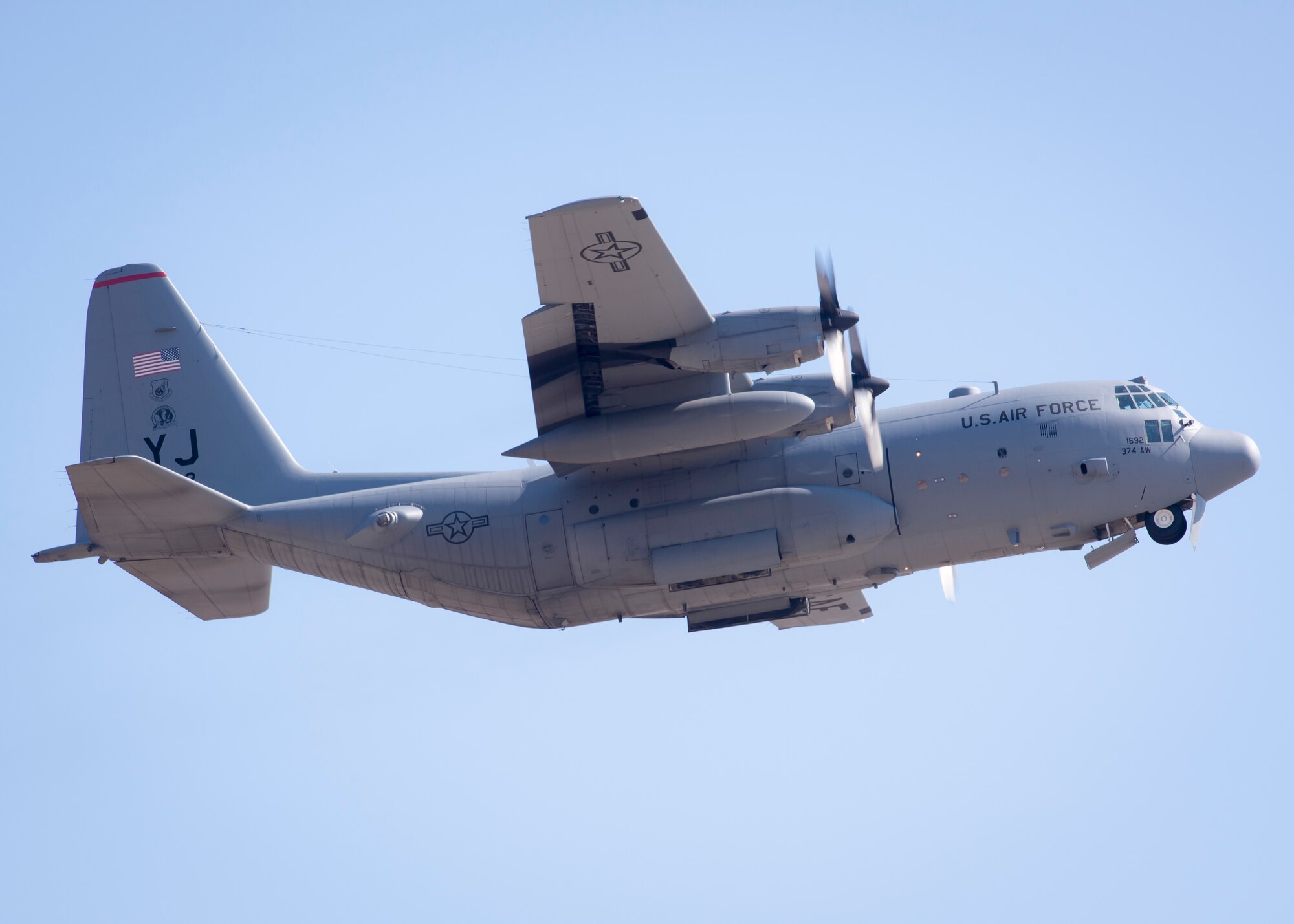 A C-130 Hercules takes off on a training mission during a Samurai Readiness Inspection at Yokota Air base, Japan, March 4, 2014. As the airlift hub of the Western Pacific, Yokota trains regularly to stay prepared for potential regional contingencies. (U.S. Air Force photo by Capt. Raymond Geoffroy/Released)
