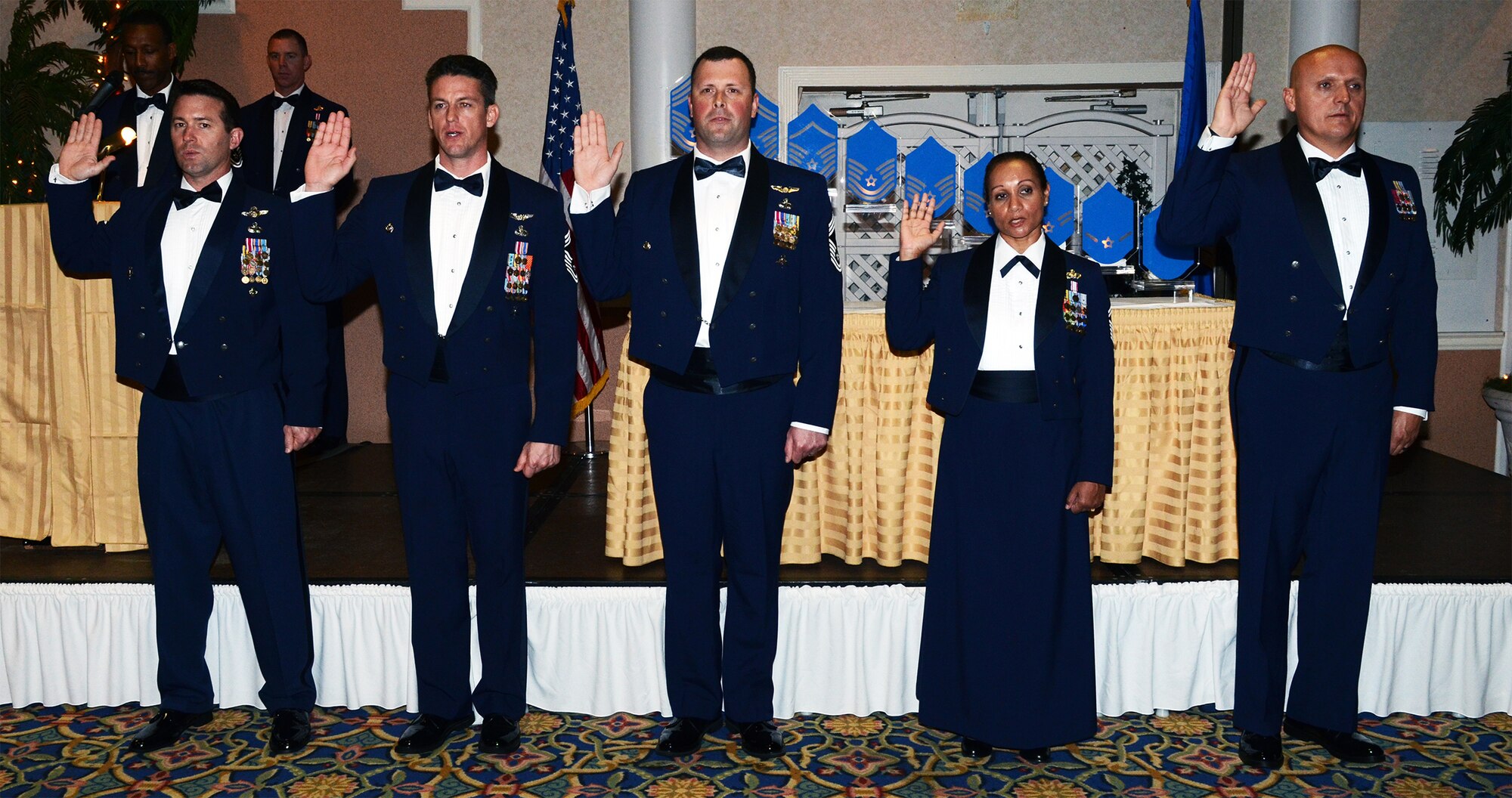 Four Air Force Reservists from the 920th Rescue Wing, Patrick AFB, Fla., and one active-duty Airmen from the 45th Space Wing, also at Patrick, recently joined the one percent of Airmen to achieve E-9 during a Chief's Recognition Ceremony held March 1 in nearby Cocoa Beach. From left to right: Chief Master Sgt. Douglas Isaacks, pararescue superintendent, 308th RQS; Chief Master Sgt. Andrew Canfield, superintendent, 304th Rescue Squadron;  Chief Master Sgt. Michael Jones, pararescue functional area manger, HQ AFRC; Senior Master Sgt. Sylvia Morris (chief-select), superintendent, 45th Logistics Readiness Squadron; Chief Master Sgt. Kenneth Swainston, chief enlisted manager, 920th Operation Support Squadron. (U.S. Air Force photo/Senior Airman Natasha Dowridge)
