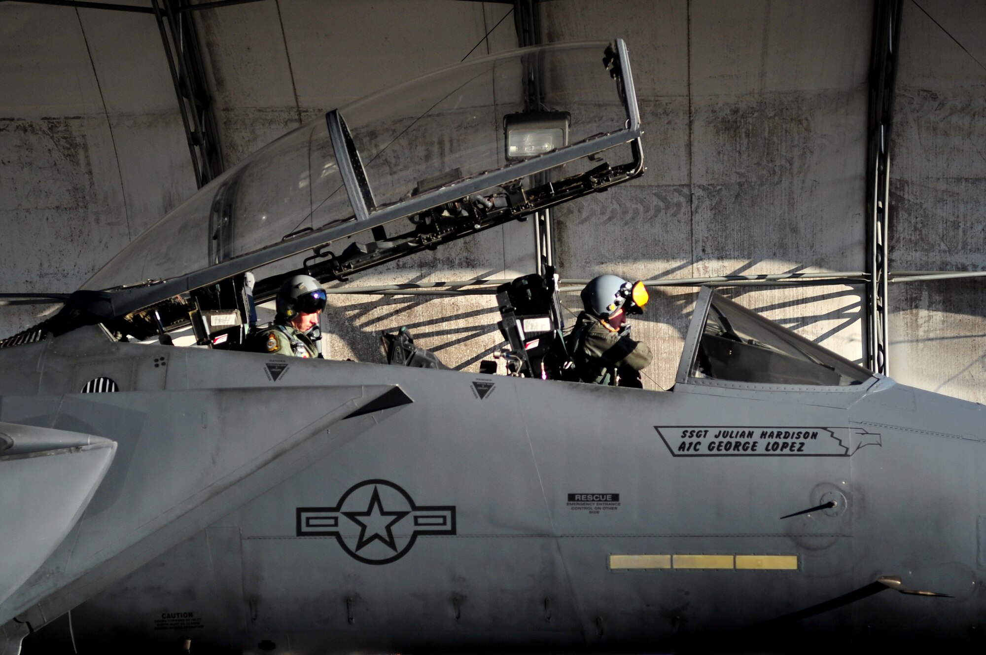 From left, Capt. Thomas Larner, 336th Fighter Squadron weapons systems officer, and Capt. Matthew Woodruff, 336th FS pilot, prepare an F-15E Strike Eagle to depart, Feb. 28, 2014, at Seymour Johnson Air Force Base, N.C. The 4th Fighter Wing aircraft flew to Nellis Air Force Base, Nev., to partake in Red Flag 14-2 training exercise, which is a realistic combat training exercise that incorporates all spectrums of warfare including command and control, real-time intelligence, analysis and exploitation, and electronic warfare. (U.S. Air Force photo/Airman 1st Class Shawna L. Keyes)   