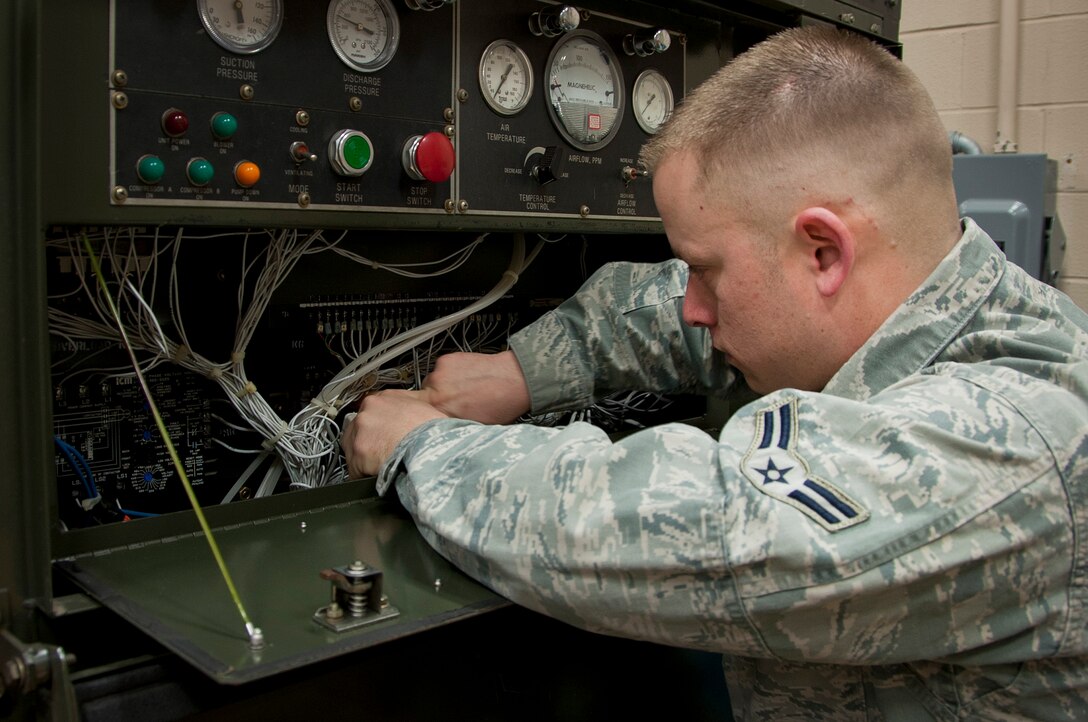 Airman 1st Class William A. Espino, 361st Training Squadron aerospace ground equipment technician,  troubleshoots electrical malfunctions on a C-5 Galaxy air conditioner trainer. Espino earned the ACE award at Sheppard Air Force Base, Texas, Feb. 28, 2014, by scoring a 100 percent average through 17 blocks of instruction. The California native is the first in 15 years to maintain a 100 percent grade point average in 15 years. (U.S. Air Force photo/Airman 1st Class Robert L. McIlrath)