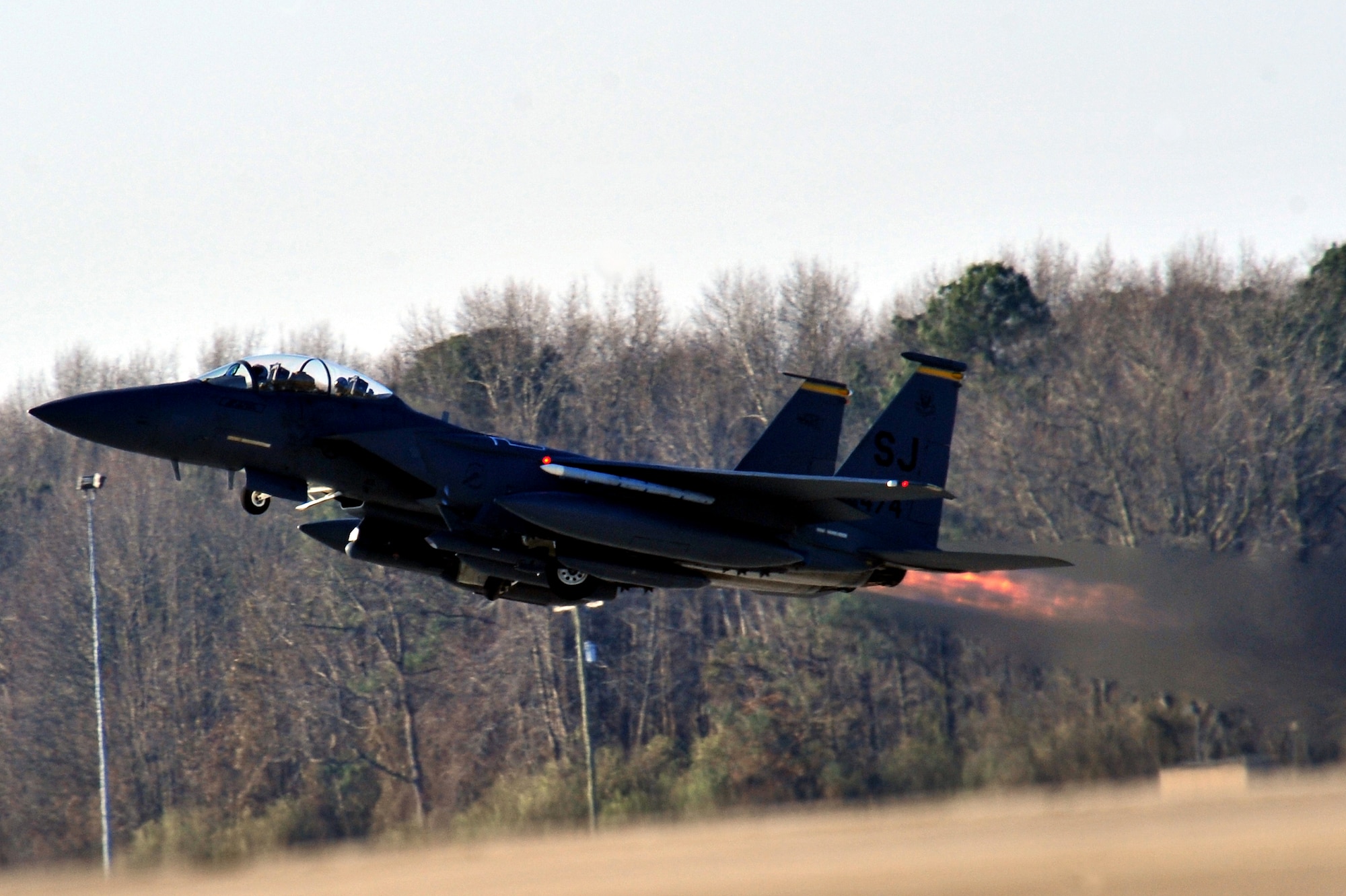 An F-15E Strike Eagle, assigned to the 336th Fighter Squadron, departs from the flight line for Red Flag 14-2 Feb. 28, 2014, at Seymour Johnson Air Force Base, N.C. Red Flag is a realistic combat training exercise at Nellis Air Force Base, Nev., that incorporates all spectrums of warfare including command and control, real-time intelligence, analysis and exploitation, and electronic warfare. (U.S. Air Force photo/Airman 1st Class Shawna L. Keyes)