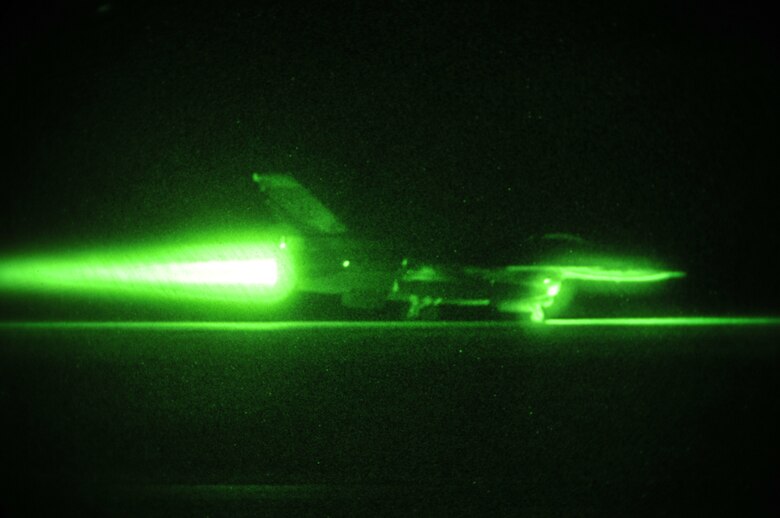Alabama Air National Guard Capt. Scott Eshelman engages the afterburner during night takeoff in an F-16 Fighting Falcon at Dannelly Field Air National Guard Base, Ala., Feb. 26, 2014. Night flying operations are used to train pilots on how to fly and fight in the dark. (U.S. Air Force photo by Tech. Sgt. Matthew Garrett)