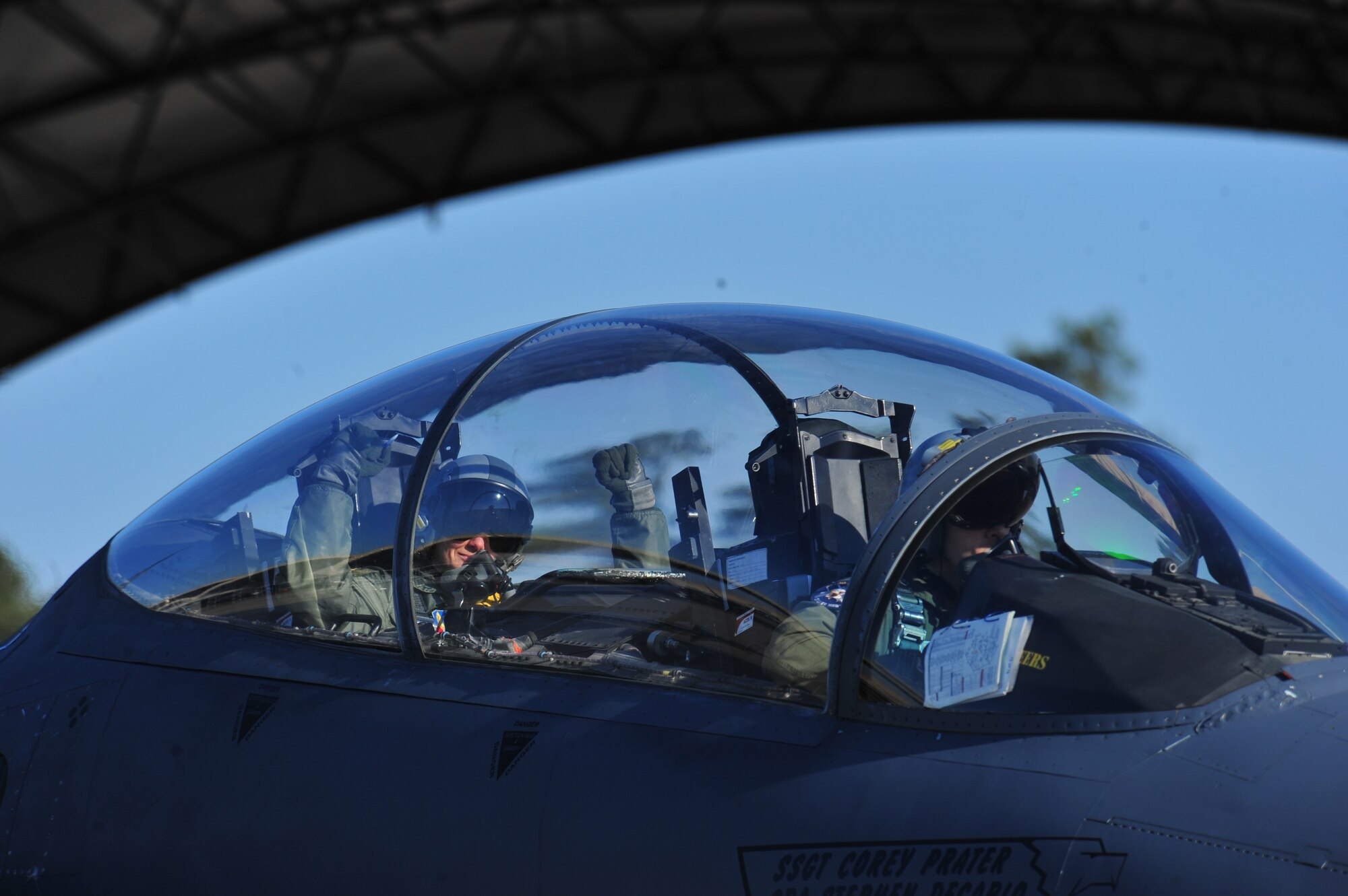 From left, Capt. Nicholas Adams, 336th Fighter Squadron weapons systems officer, and Maj. James Duncan, 336th FS pilot, taxi to the runway in an F-15E Strike Eagle Feb. 28, 2014, at Seymour Johnson Air Force Base, N.C. Airmen from the 336th FS, left to participate in Red Flag 14-2 at Nellis Air Force Base, Nev. Red Flag is a realistic combat training exercise that incorporates all spectrums of warfare including command and control, real-time intelligence, analysis and exploitation, and electronic warfare.  (U.S. Air Force photo/Airman 1st Class Shawna L. Keyes) 