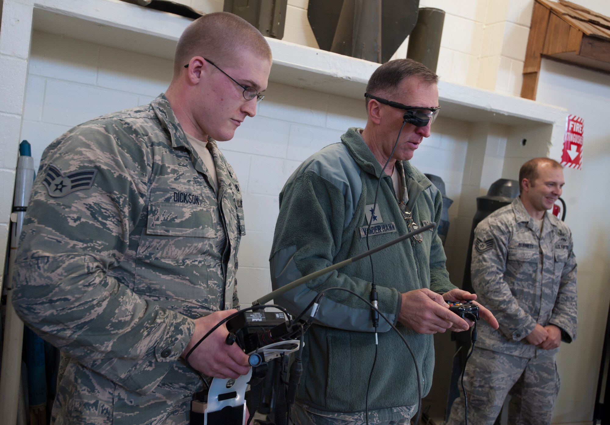 Maj. Gen. Scott Vander Hamm, Eighth Air Force commander, maneuvers an explosive ordnance disposal robot at Minot Air Force Base, N.D., Feb. 25, 2014. During Vander Hamm’s first visit as 8th AF commander, he toured the different squadrons of the 5th Bomb Wing to learn first-hand about the mission here. (U.S. Air Force photo/Airman 1st Class Apryl Hall)