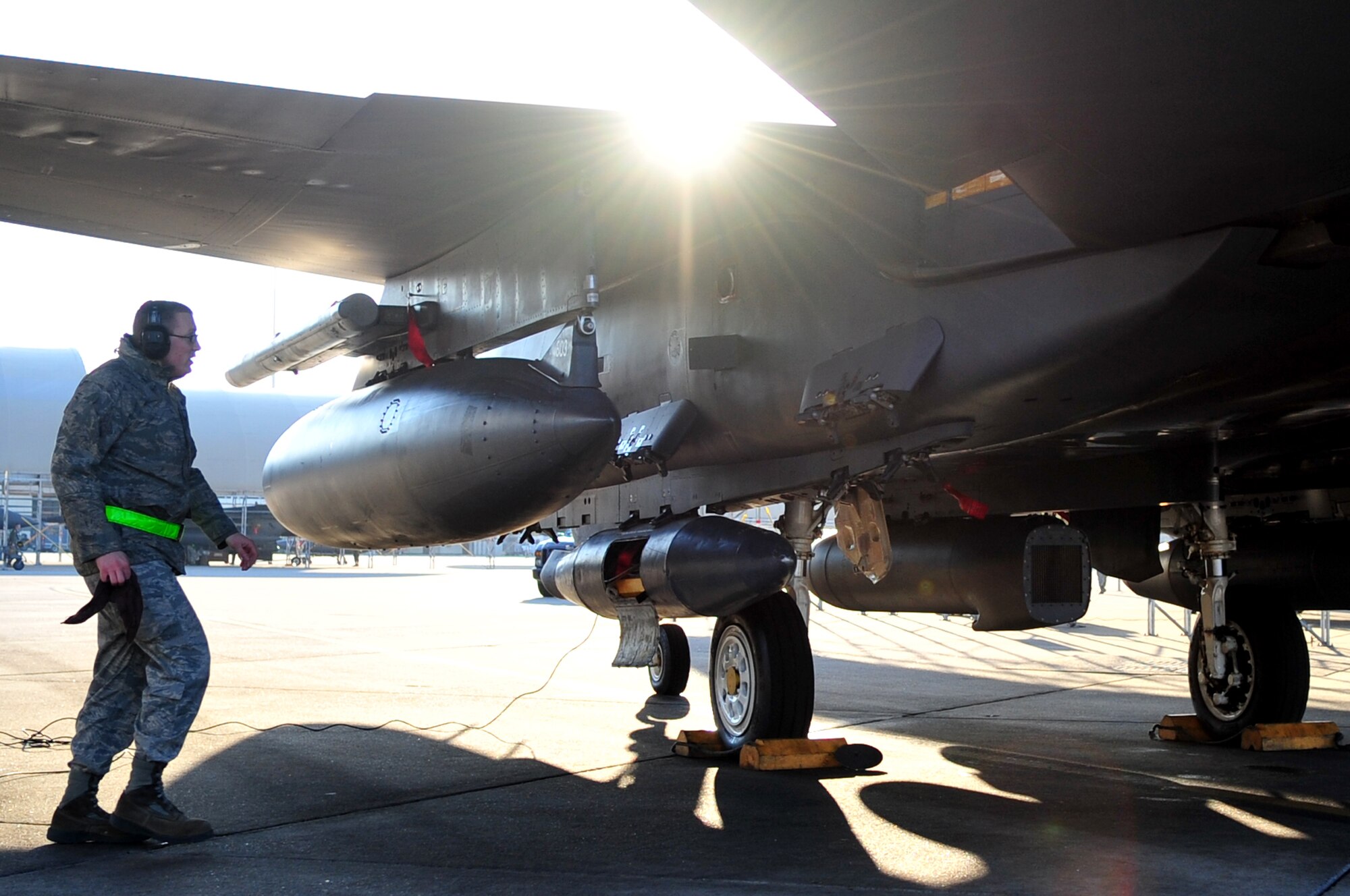 Tech. Sergeant Brandon Takacs, 4th Aircraft Maintenance Squadron assistant aircraft section chief, performs a maintenance check on an F-15E Strike Eagle prior to takeoff, Feb. 28, 2014, at Seymour Johnson Air Force Base, N.C. The 4th Fighter Wing aircraft flew to Nellis Air Force Base, Nev., to partake in Red Flag 14-2 training exercise, which is a realistic combat training exercise. (U.S. Air Force photo/Airman 1st Class Shawna L. Keyes)