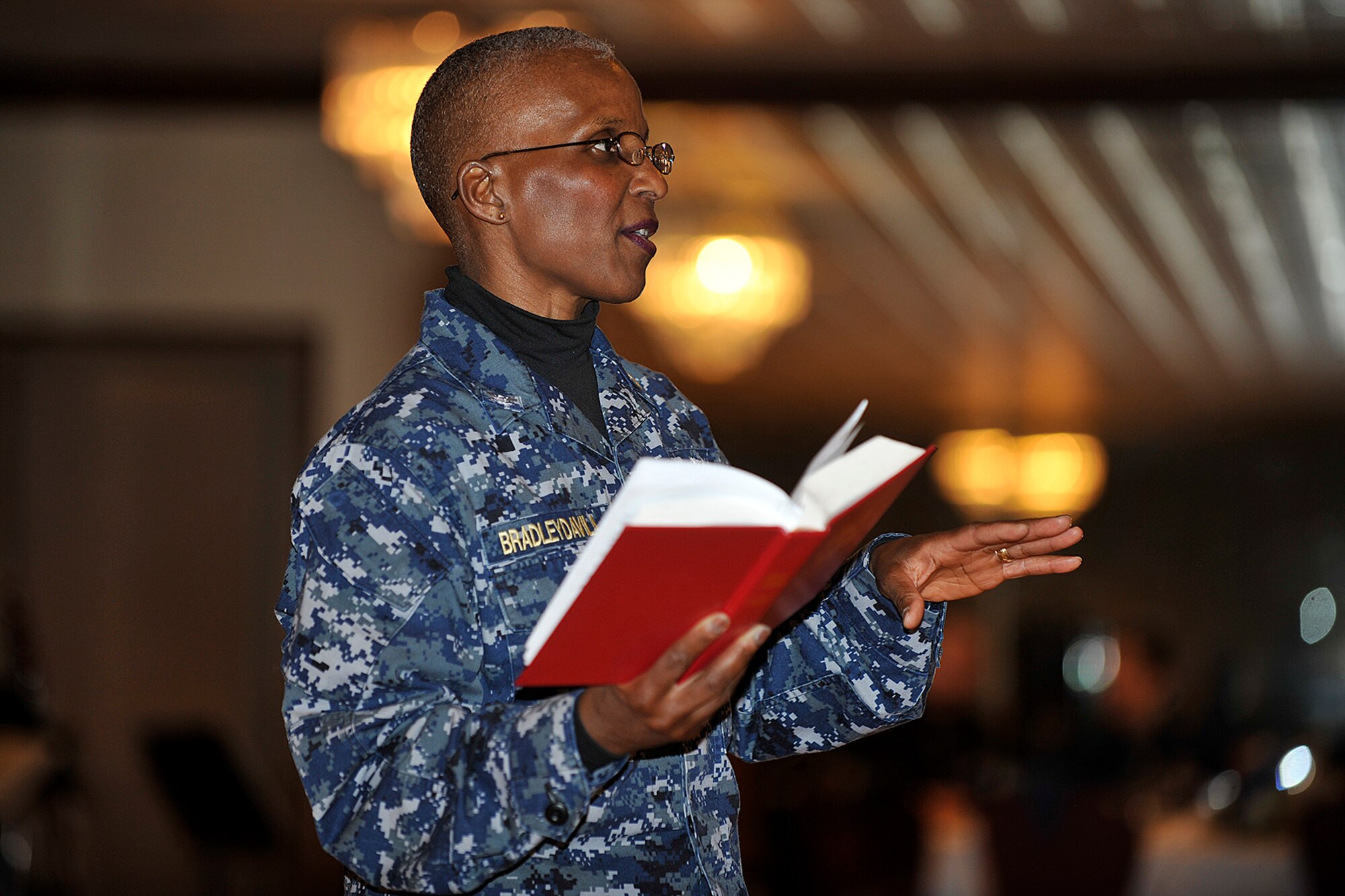 PETERSON AIR FORCE BASE, Colo. – Chaplain (Navy Capt.) Brenda BradleyDavila, North American Aerospace Defense and United States Northern Command chaplain, shares her message with the audience at the National Prayer Luncheon Feb. 26 at the Club. “Don’t Quit” was this year’s theme. BradleyDavila shared an enlightened and thought provoking message that everyone has a purpose and to never quit when faced with adversity. (U.S. Air Force photo/Dennis Howk)