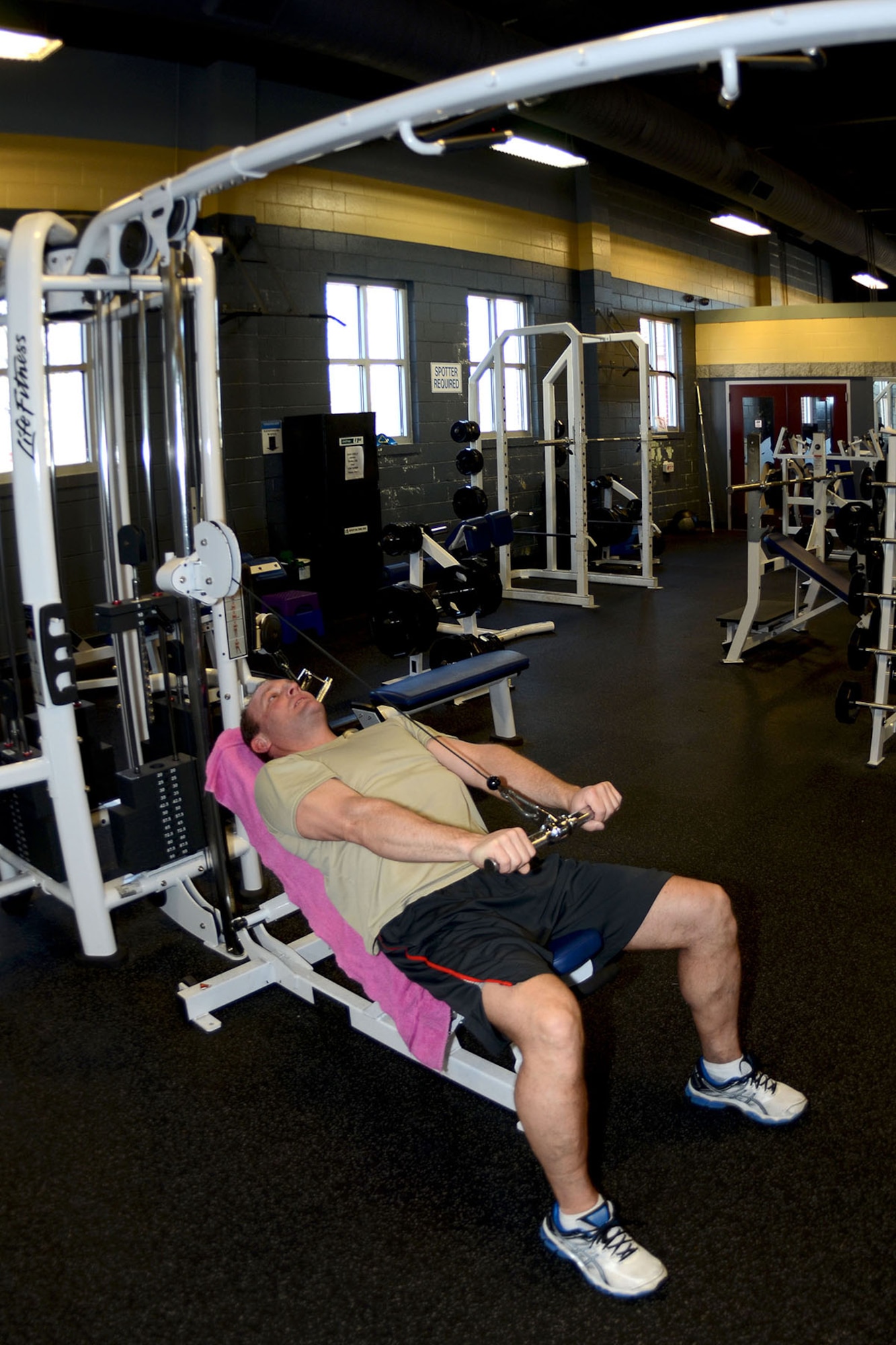 U.S. Air Force Master Sgt. John Jones, with the 169th Fighter Wing safety office at McEntire Joint National Guard Base, South Carolina Air National Guard, conducts his workout in the base gym, Feb. 25, 2014.  (U.S. Air National Guard photo by Tech. Sgt. Caycee Watson/Released)