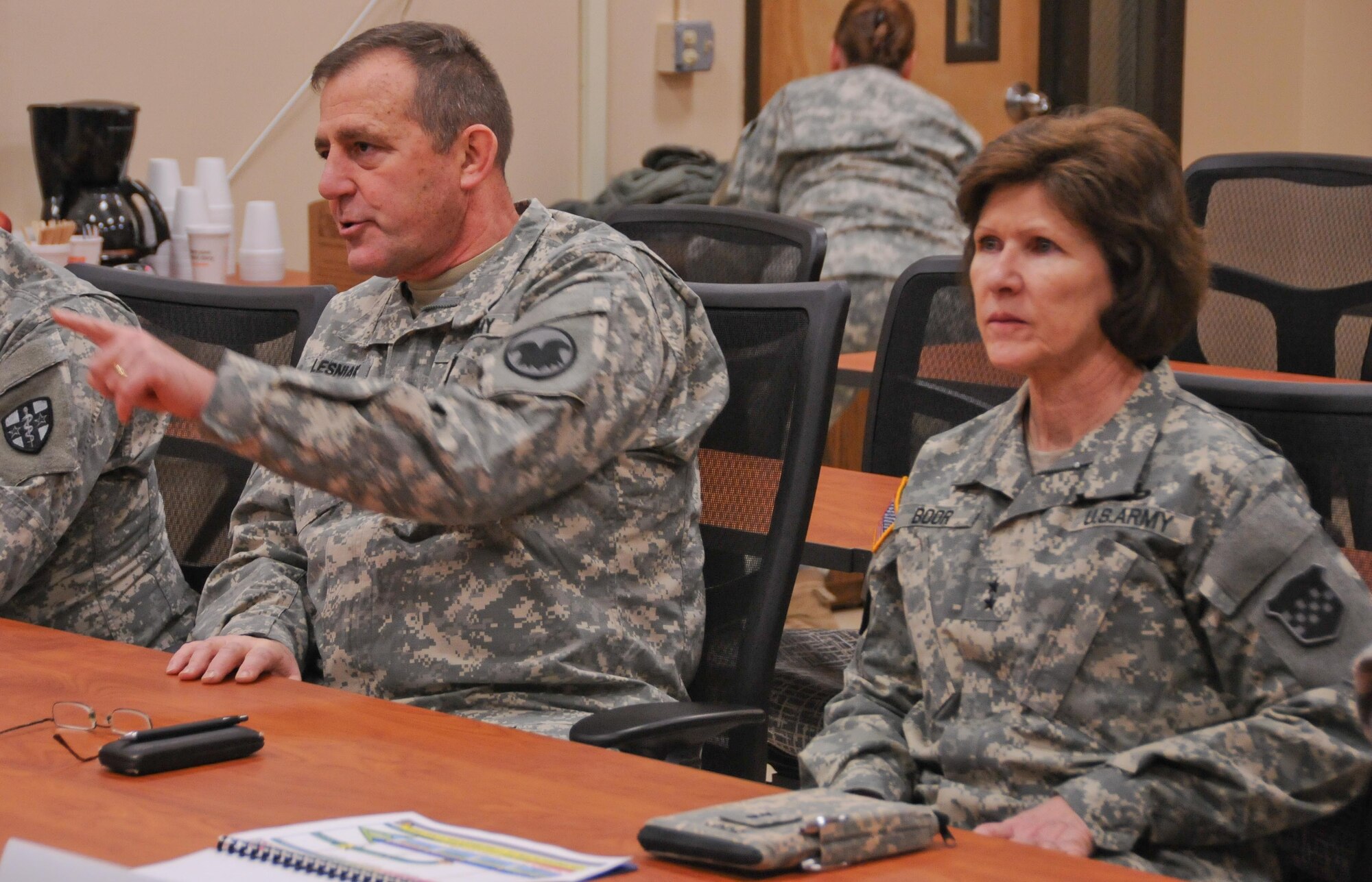 Gen. Glenn J. Lesniak, deputy commanding general (Support) of the Army Reserve, left, and Maj. Gen. Margaret W. Boor, commanding general of the Army Reserve’s 99th Regional Support Command, brief congressional staff members Feb. 24 during a tour of the joint Combat Support Training Exercise hosted by the Army Reserve's 78th Training Division at Joint Base McGuire-Dix-Lakehurst, N.J. The staff-delegation tour was designed to highlight the Army Reserve's capabilities as an operational force and the importance of maintaining these capabilities into the future. (U.S. Army photo by Staff Sgt. Shawn Morris/Released)