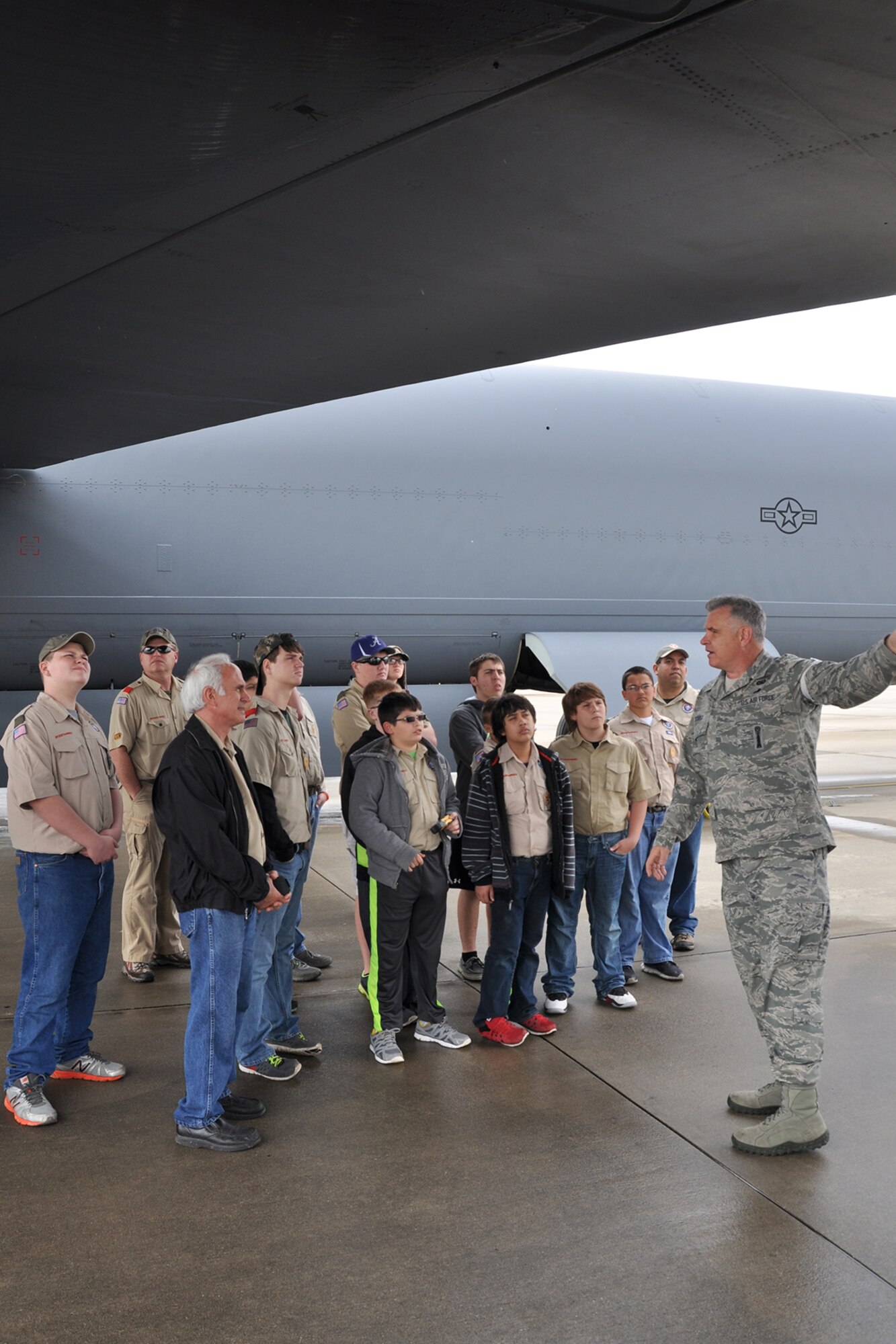 U.S. Air Force Master Sgt. Greg Steele, 307th Bomb Wing Public Affairs, explains the specifications of the B-52 to Boy Scout Troop 531 out of Angleton, Texas, March 1, 2014. The Troop visited Barksdale Air Force Base, La., for an orientation tour including visits to the engine shop, life support, munitions storage area and Global Power Museum.  (U.S. Air Force photo by Master Sgt. Mary Hinson/Released)