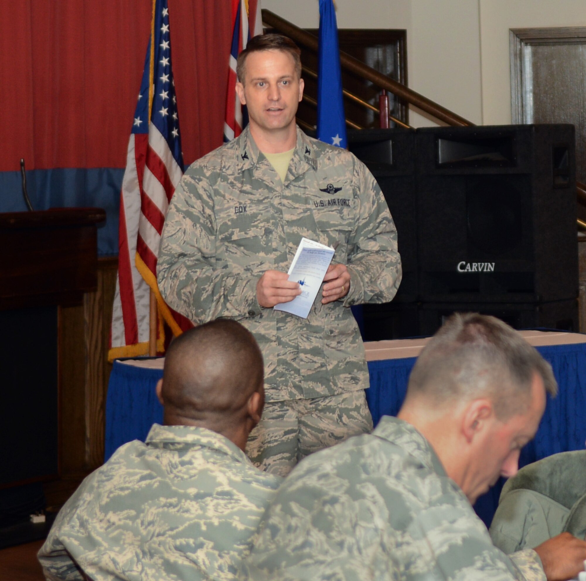 U.S. Air Force Col. David Cox, 100th Air Refueling Wing vice commander, addresses the 2014 Air Force Assistance Fund Kickoff Breakfast attendees March 3, 2014, on RAF Mildenhall, England. Each year, the AFAF campaign raises money in support of Airmen around the world. The breakfast acted as the starting point for Team Mildenhall’s individual campaign, which ends April 11, 2014. (U.S. Air Force photo by Airman 1st Class Jonathan Light/Released)