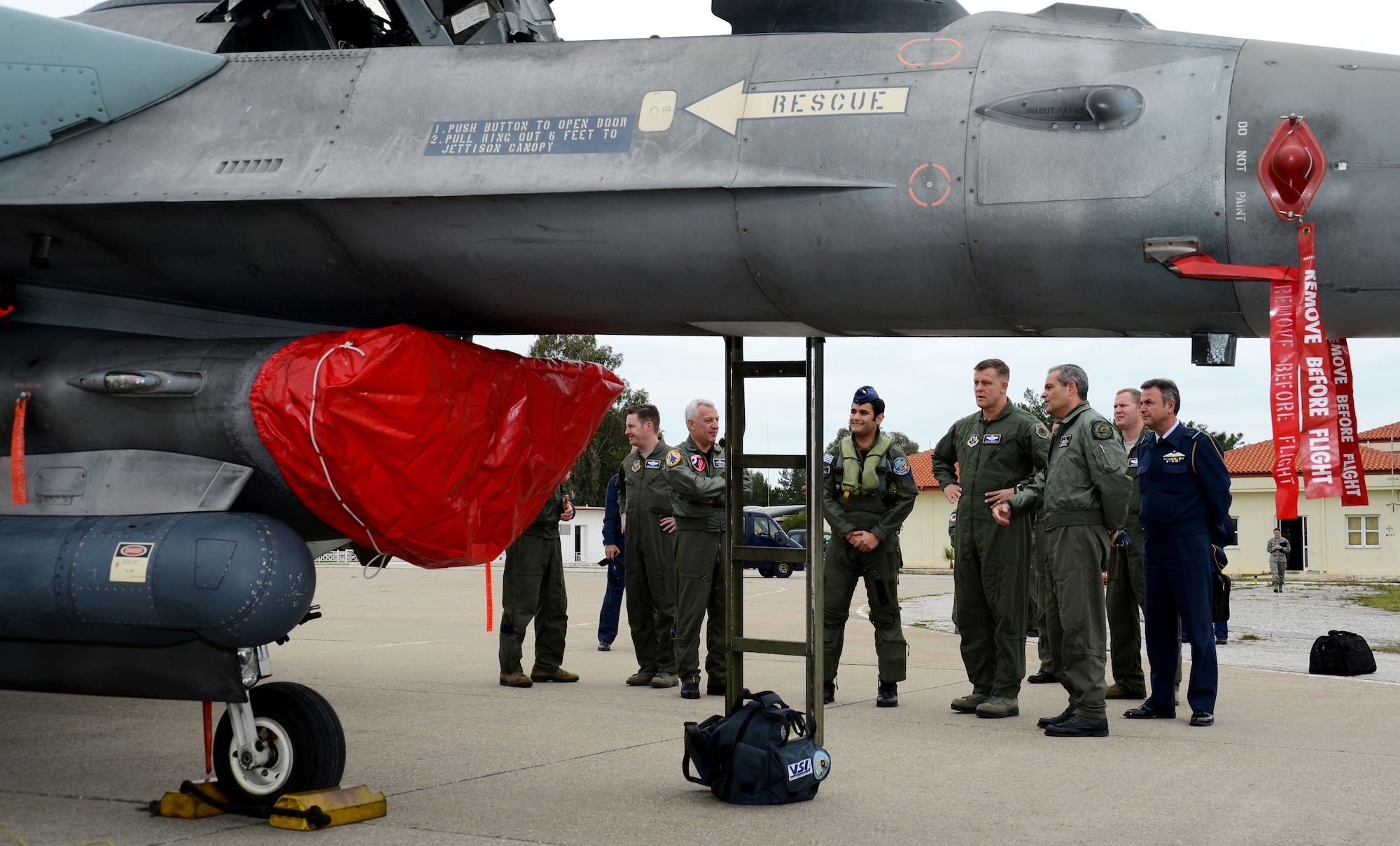 Members of the Hellenic air force give a tour of their F-16 Block 52 to Gen. Frank Gorenc, U.S. Air Forces in Europe-Air Forces Africa and Allied Air Command commander, at Souda Air Base, Greece. After multinational training, Feb. 28, 2014, Gorenc visited the HAF’s 343rd Fighter Squadron and the U.S. Air Force’s 494th Expeditionary Fighter Squadron, which deployed with F-15E Strike Eagles to the island of Crete. (U.S. Air Force photo by Staff Sgt. Thomas Trower/Released)