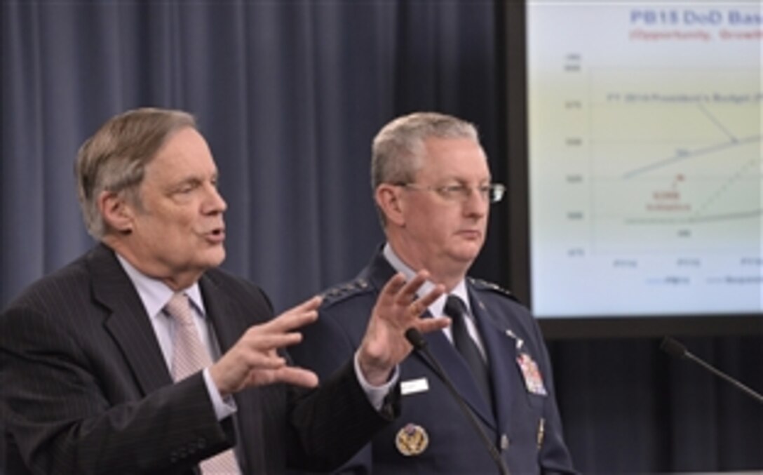 Robert F. Hale, left, the Defense Department's comptroller, and Air Force Lt. Gen. Mark F. Ramsay, Joint Staff director for force structure, resources and assessments, brief reporters on the department's fiscal year 2015 budget request at the Pentagon, March 4, 2014.