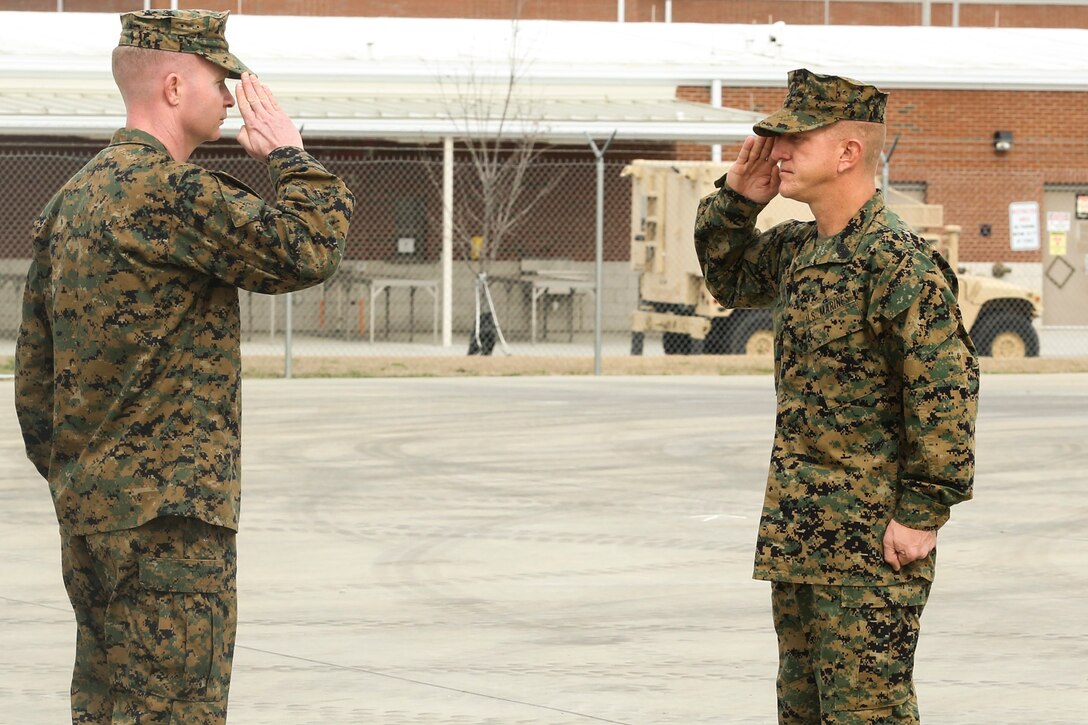 Sergeant Maj. Jonathan D. Martin (right), the new sergeant major of 2nd Battalion, 8th Marine Regiment, 2nd Marine Division, salutes Lt. Col. Jeffrey R. Stevenson during the Post and Relief Ceremony aboard Marine Corps Base Camp Lejeune March 3, 2014. Martin relieved Sgt. Maj. Timonthy J. Rudd as the battalion sergeant major. The ceremony is a time-honored tradition to represent a transfer of total responsibility, authority and accountability between the sergeants major. Martin is returning to the United States from a tour of duty at Guantanamo Bay, Cuba, where he was the company first sergeant for Marine Corps Security Force Co. This is Martin’s first billet as a sergeant major since being promoted in Feb. 2014.