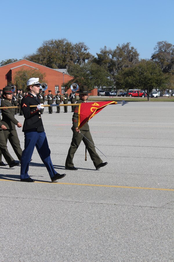 U.S. Marine Corps Pfc. Callahan Brown marches in front of her platoon as the Company Honor Graduate from Platoon 4007, Papa Co., 4th Recruit Training Battalion, who graduated Feb. 28, 2014.  She was recruited out of Recruiting Station Frederick by Staff Sgt. Craig Taylor. (U.S. Marine Corps photo by Cpl. Nicholas S. Ranum/Released)