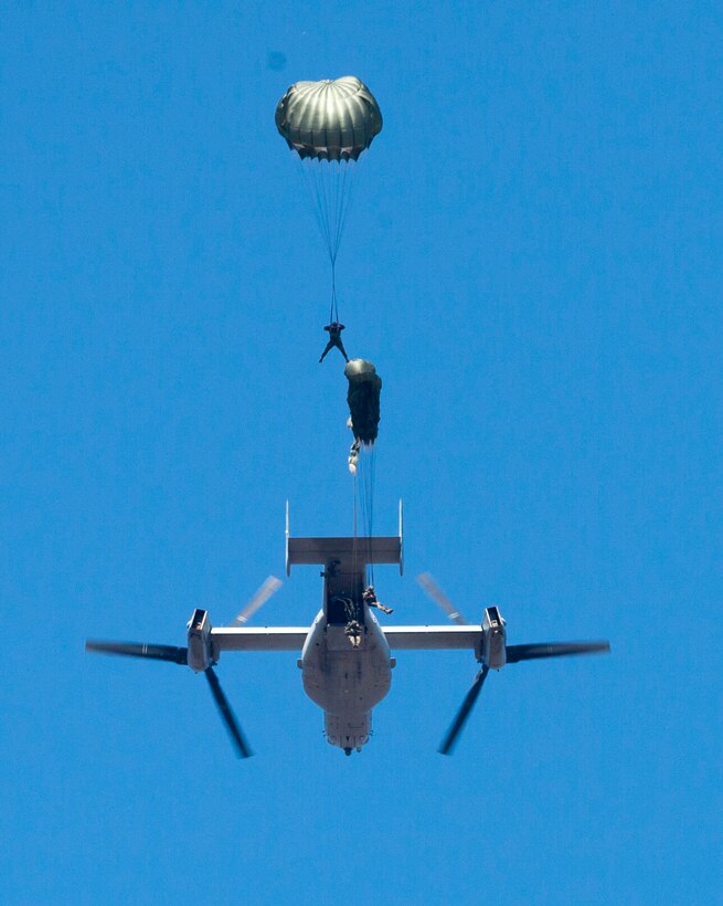 Reconnaissance Marines with Force Company, 2nd Reconnaissance Battalion, 2nd Marine Division, jump from the back of a V-22 Osprey during a rehearsal jump before conducting a three-day exercise Feb. 18, 2014 at Marine Corps Base Camp Lejeune, N.C. The rehearsal jump re-familiarized Marines with jump procedures and helped each member of the team walk through his responsibility before jumping for the exercise a few hours later. 
