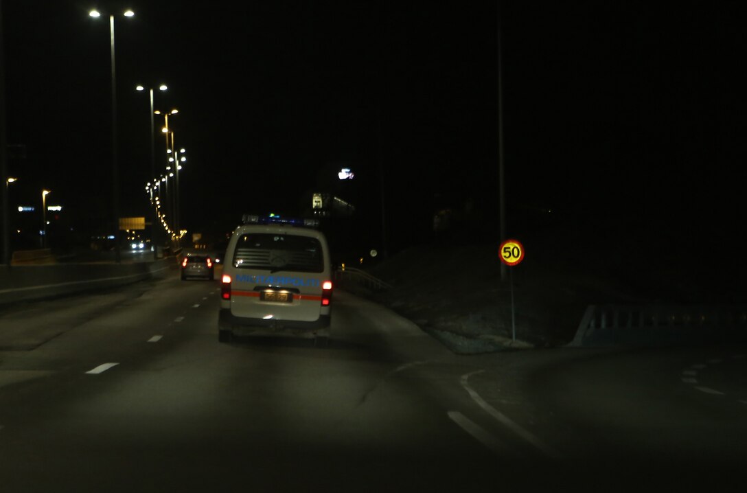A Norwegian military police van carrying MPs with 2nd Supply Battalion, Combat Logistics Regiment 25, 2nd Marine Logistics Group and Home Guard District 12 drives toward Trondheim, Norway, Feb. 25, 2014. The MPs travelled to Trondheim during a patrol to ensure security and safety of troops in the city before Cold Response 2014. Cold Response 2014 is a Norwegian-led multinational exercise above the Arctic Circle designed prepare for crisis response operations.