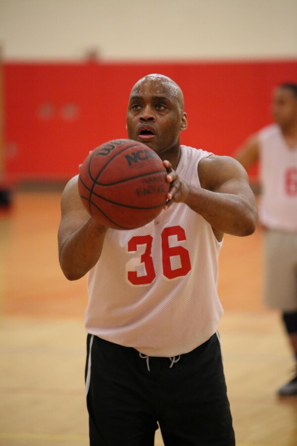 Julian Goodman, an Enlisted Instructor Platoon player, prepares to take a foul shot during an intramural basketball game against the Weapons Training Battalion at the Barber Physical Fitness Activity on Feb. 25, 2014. EIP lost 52-34. 